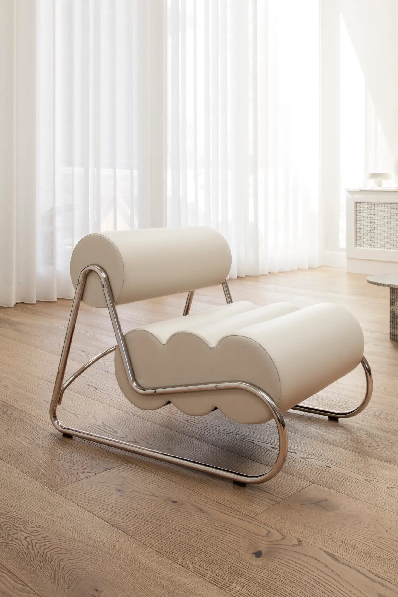Modern Fave Lounge Chair in luxurious white velvet with ergonomic lumbar support