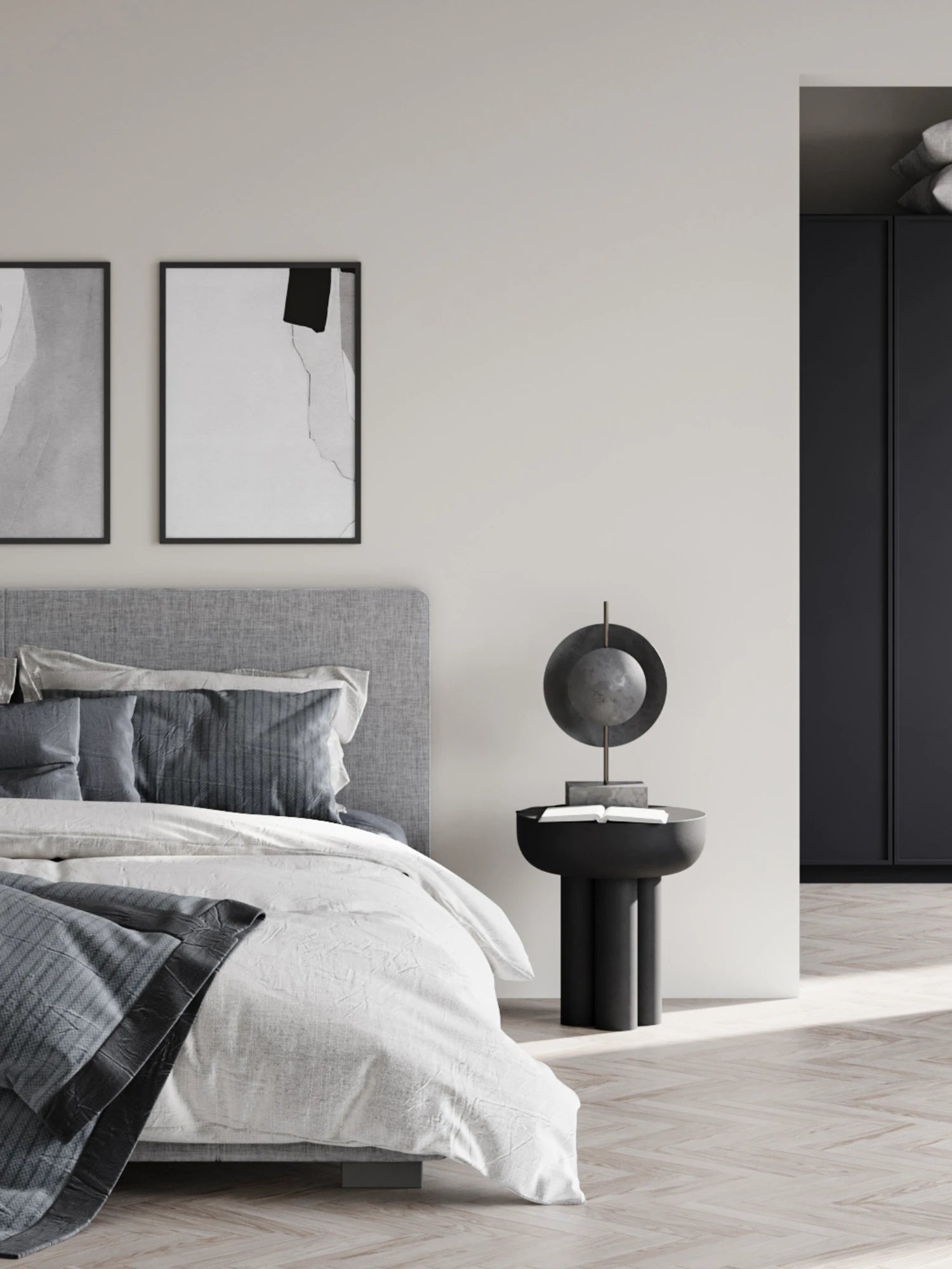 101 CPH Crown Side Table, shown in a clean, contemporary bedroom. This premium black concrete side table features a unique cylindrical leg design and a recessed top, styled with a modern sculpture and an open book. Ideal for a chic bedroom or living space.