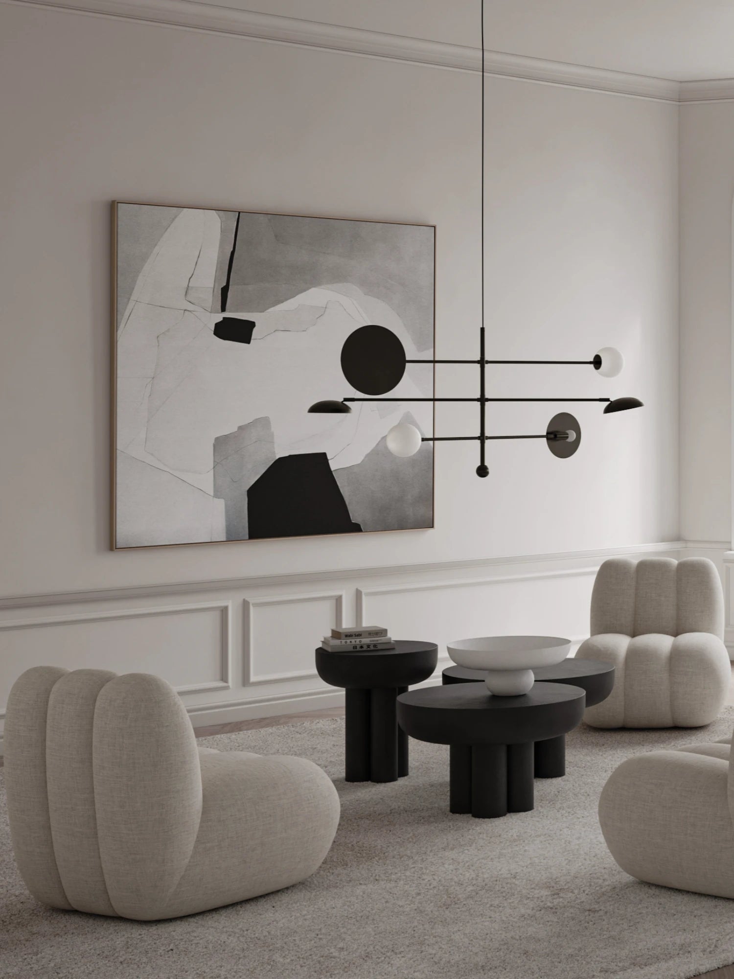 101 CPH Crown Side Table. A set of three matte black, modernist side tables with chunky leg bases, arranged on a light grey shag rug next to two upholstered beige lounge chairs. A premium centerpiece for any modern living space.