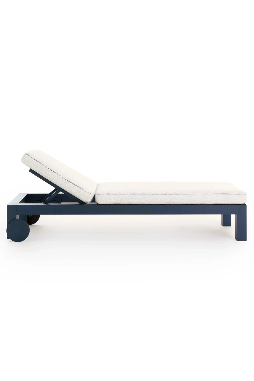 Gandia Blasco Islablanca Outdoor Chaise Lounge, a sleek modern outdoor sunbed featuring a dark navy blue powder-coated aluminum frame with a minimalist rectangular profile and integrated wheels. It is topped with a plush, off-white outdoor fabric cushion, offering an adjustable backrest for ultimate comfort. Ideal for contemporary patio settings, luxury poolside lounging, or coastal outdoor spaces.