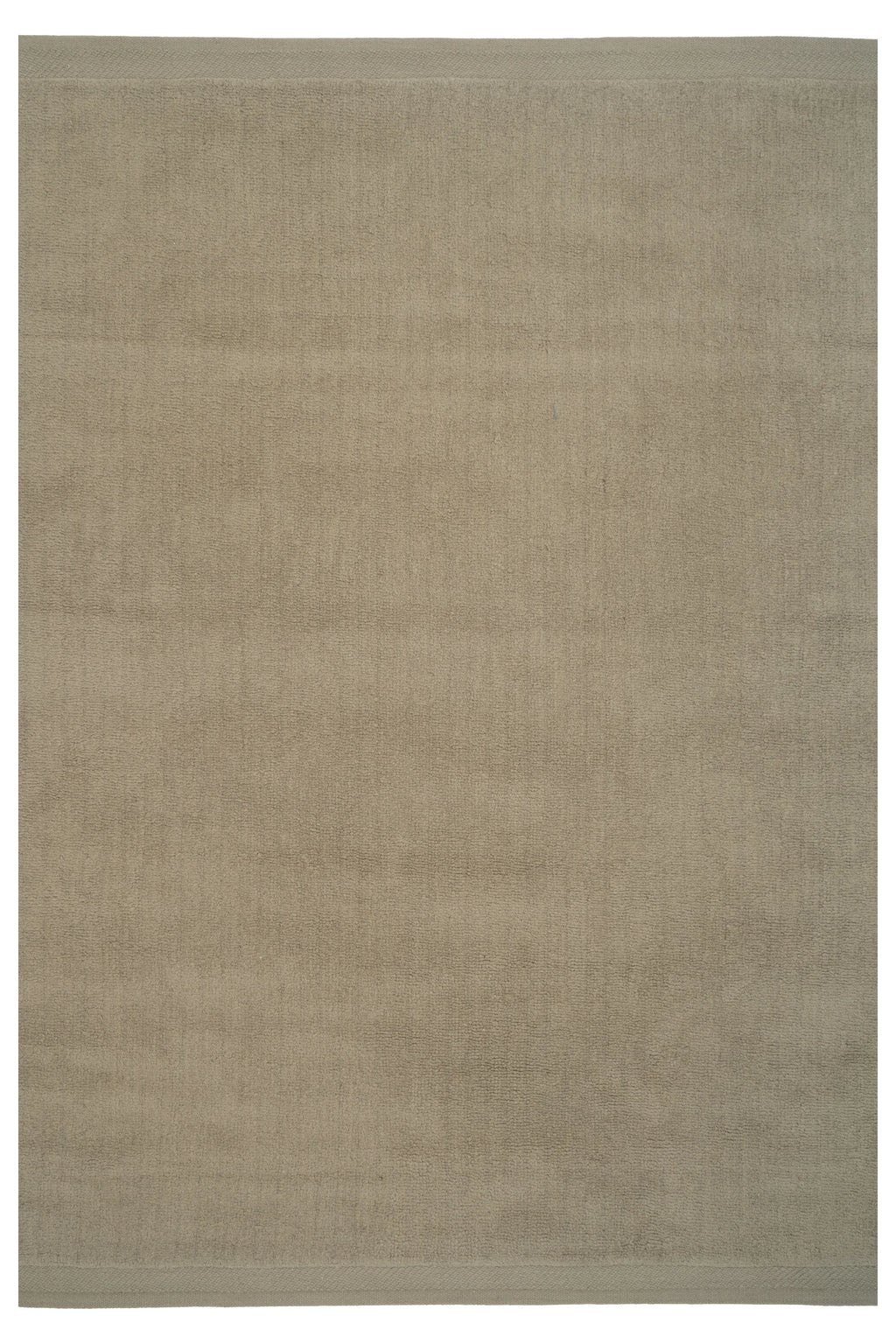 Linie Design Hushed Frame Rug, a plush hand-knotted wool area rug in a versatile greige hue, featuring a soft, textured pile main field and a subtly contrasting woven border detail. This modern minimalist rug is ideal for adding warmth and organic style to Scandinavian living rooms, contemporary bedrooms, or cozy home offices.