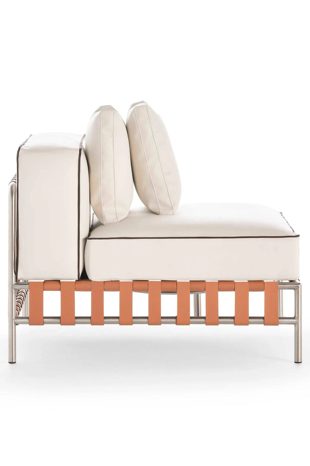 Gandia Blasco Onsen Sectional 3, a modern outdoor chaise lounge featuring a sleek brushed stainless steel frame and a unique woven base of tan synthetic leather straps. It is topped with plush, weather-resistant cream outdoor fabric cushions and two accent pillows with contrasting dark piping.