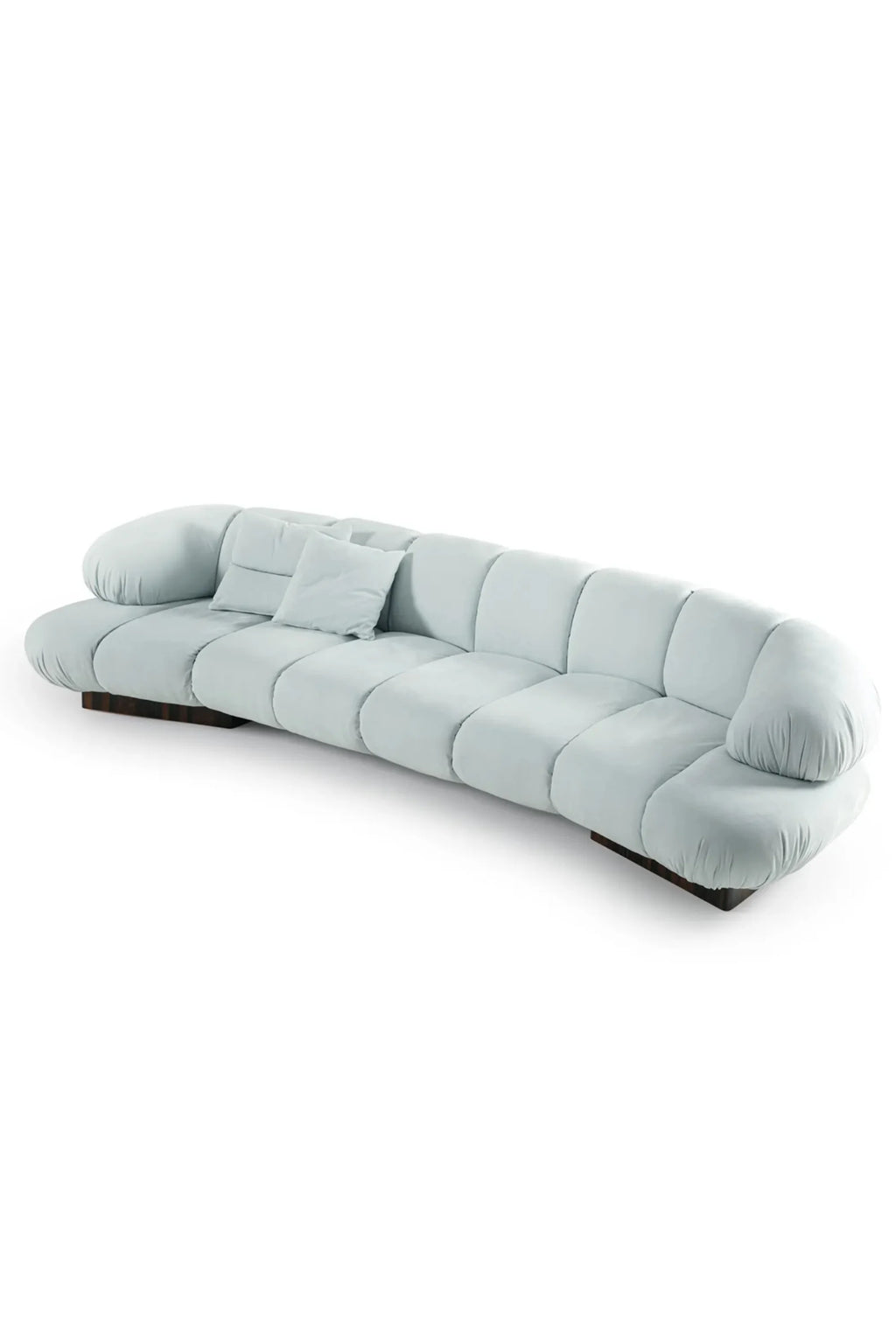 Hessentia Kiro Long Sofa, a luxurious organic modern long sofa upholstered in a soft, pale blue fabric with a plush, gathered texture and distinctive rounded, cloud-like cushions. This contemporary low-profile design features a minimalist dark wood base and a long, undulating silhouette for a comfortable yet elegant aesthetic. Ideal as a statement piece for spacious living rooms or a sophisticated addition to minimalist and organic modern interiors.