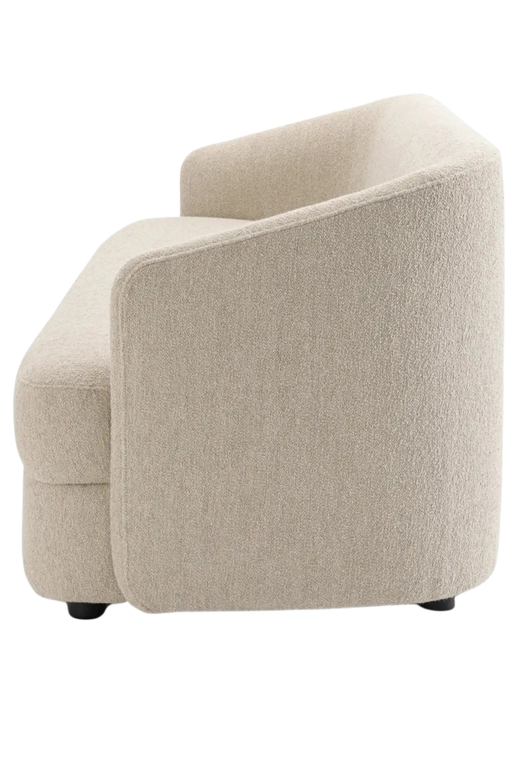 New Works Covent Sofa Deep 3-Seater, a contemporary 3-seater sofa upholstered in a soft, textured cream bouclé fabric, featuring a sculptural, organic silhouette with gently curved armrests that flow into the deep backrest and plush seating. Ideal for modern minimalist living rooms or as a luxurious lounge sofa in organic modern interiors.