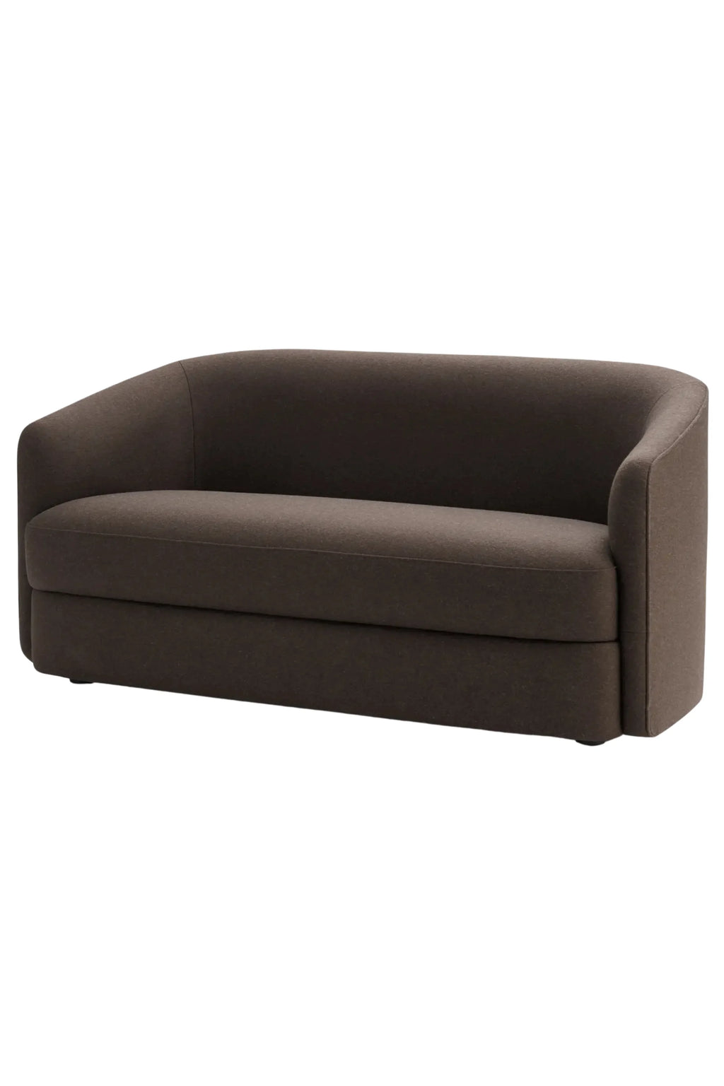 New Works Covent Sofa Narrow 2-Seater, a compact modern sofa upholstered in a deep espresso brown textured fabric with a distinctive gently curved, organic profile and minimalist design. This stylish 2-seater sofa is an ideal furniture piece for small living rooms, contemporary apartments, or cozy reading nooks seeking an organic modern aesthetic.
