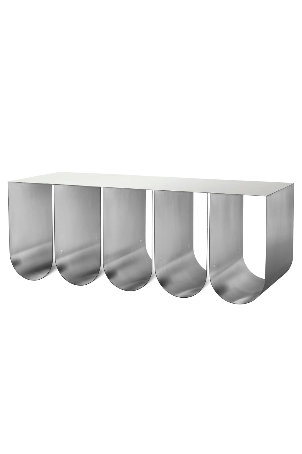 Kristina Dam Curved Bench, a sleek modern minimalist bench crafted from brushed stainless steel with a metallic silver finish and a distinctive series of five U-shaped supports creating an architectural profile. This contemporary industrial chic metal bench is perfect as an entryway console, living room accent, or for brutalist-inspired interior design.