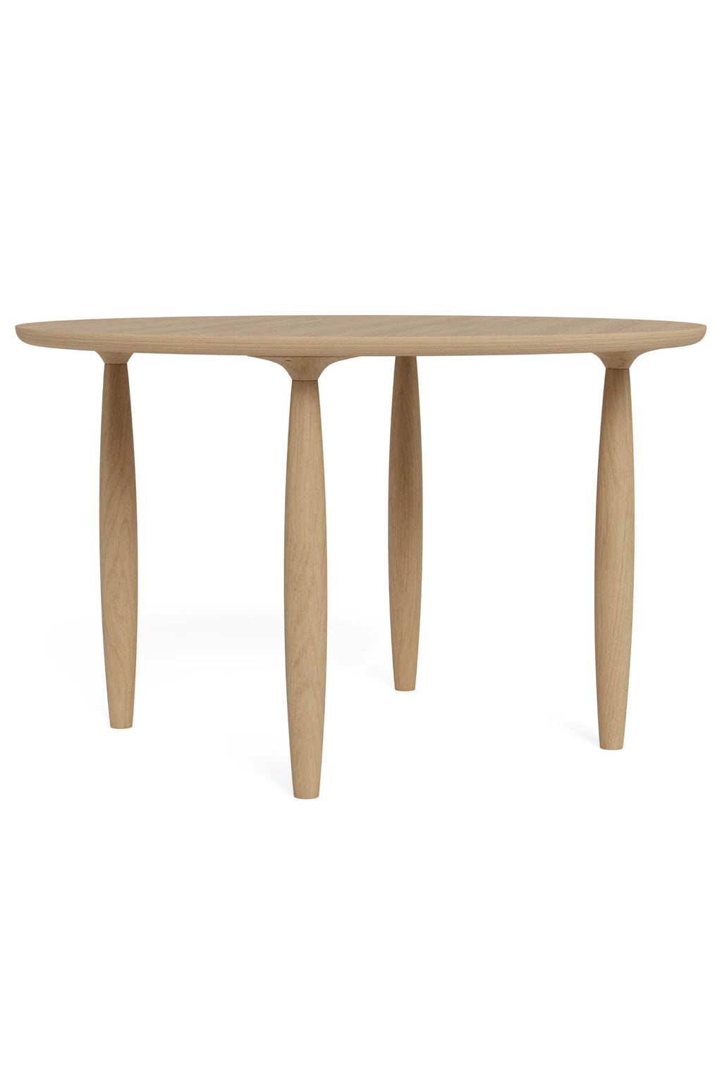 NORR11 Oku Round Dining Table, a contemporary solid oak dining table featuring a smooth, light natural wood finish and a gracefully thin round tabletop. Its organic modern design is supported by four beautifully sculpted, tapered legs, showcasing minimalist Scandinavian craftsmanship. Ideal for stylish dining rooms, modern kitchens, or japandi-inspired living spaces.