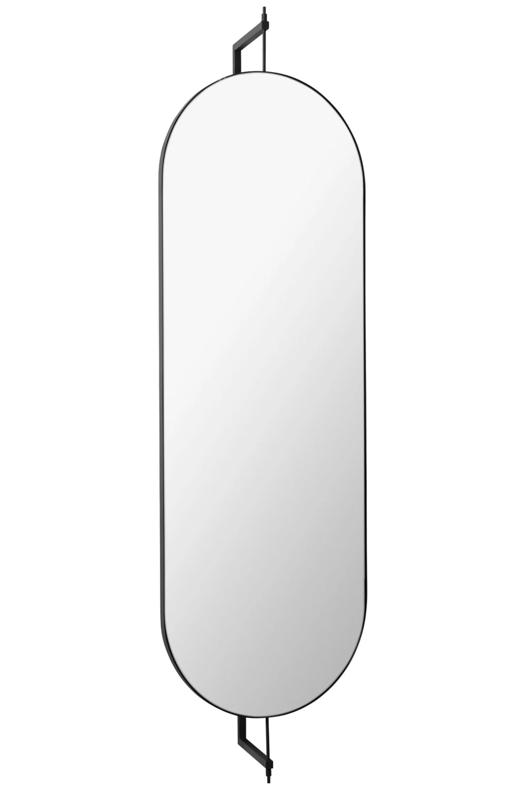 Kristina Dam Full Size Rotating Mirror, a modern minimalist full-length mirror featuring a sleek matte black metal frame and an elongated oval capsule shape. This contemporary rotating wall mirror is suspended by a functional black metal bracket, allowing for adjustable viewing angles. Ideal as a Scandinavian entryway mirror, bedroom accent, or stylish dressing mirror for modern interiors.