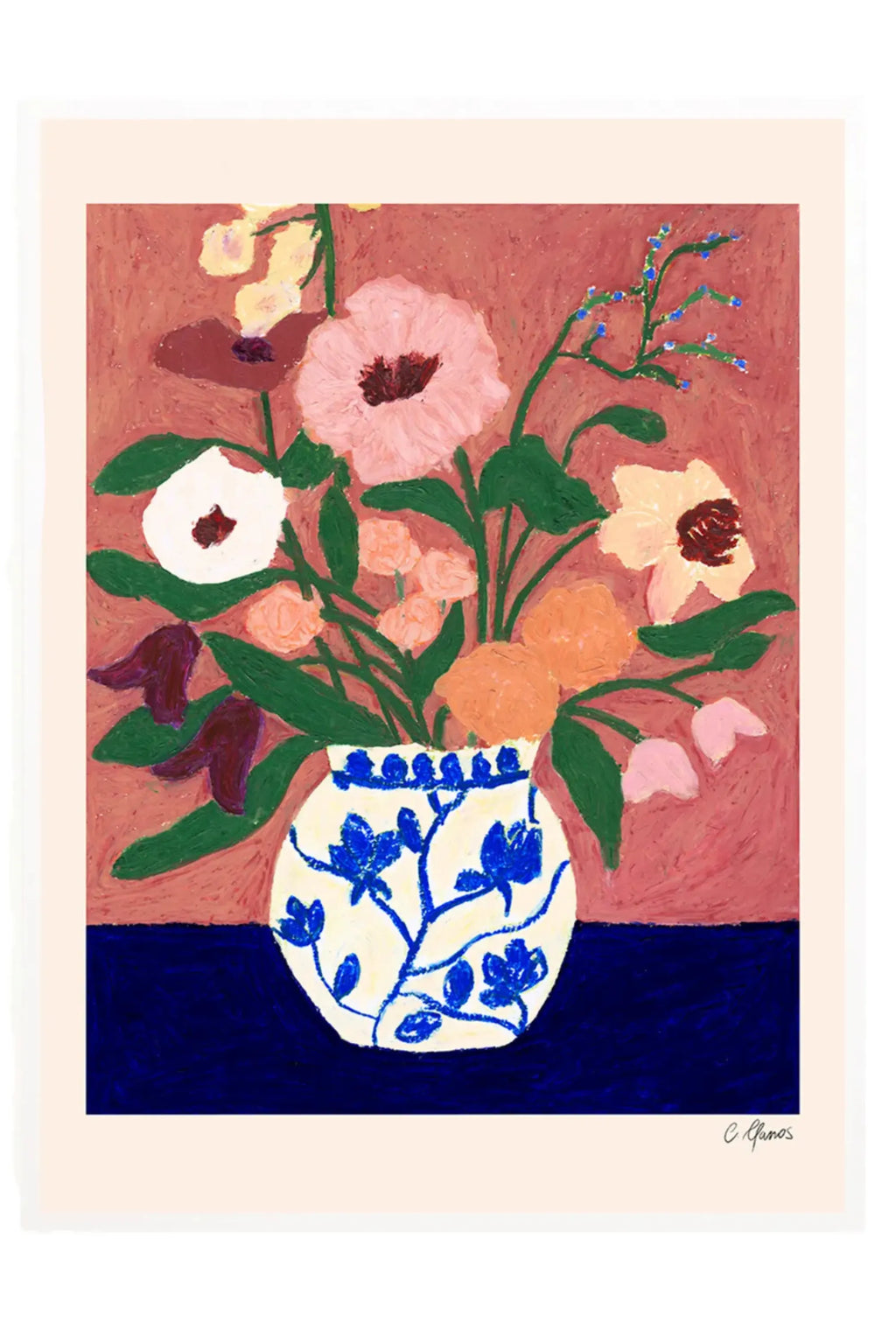 The Poster Club Flowers on Blue Table, a vibrant textured art print featuring a bouquet of colorful flowers in a white vase with blue folk art patterns, set against a dusty rose background and a deep navy blue table. This naive floral style poster, with its rich oil pastel texture, offers a contemporary wall art piece. Perfect for bohemian living rooms, cozy bedrooms, or adding a pop of color to a gallery wall.