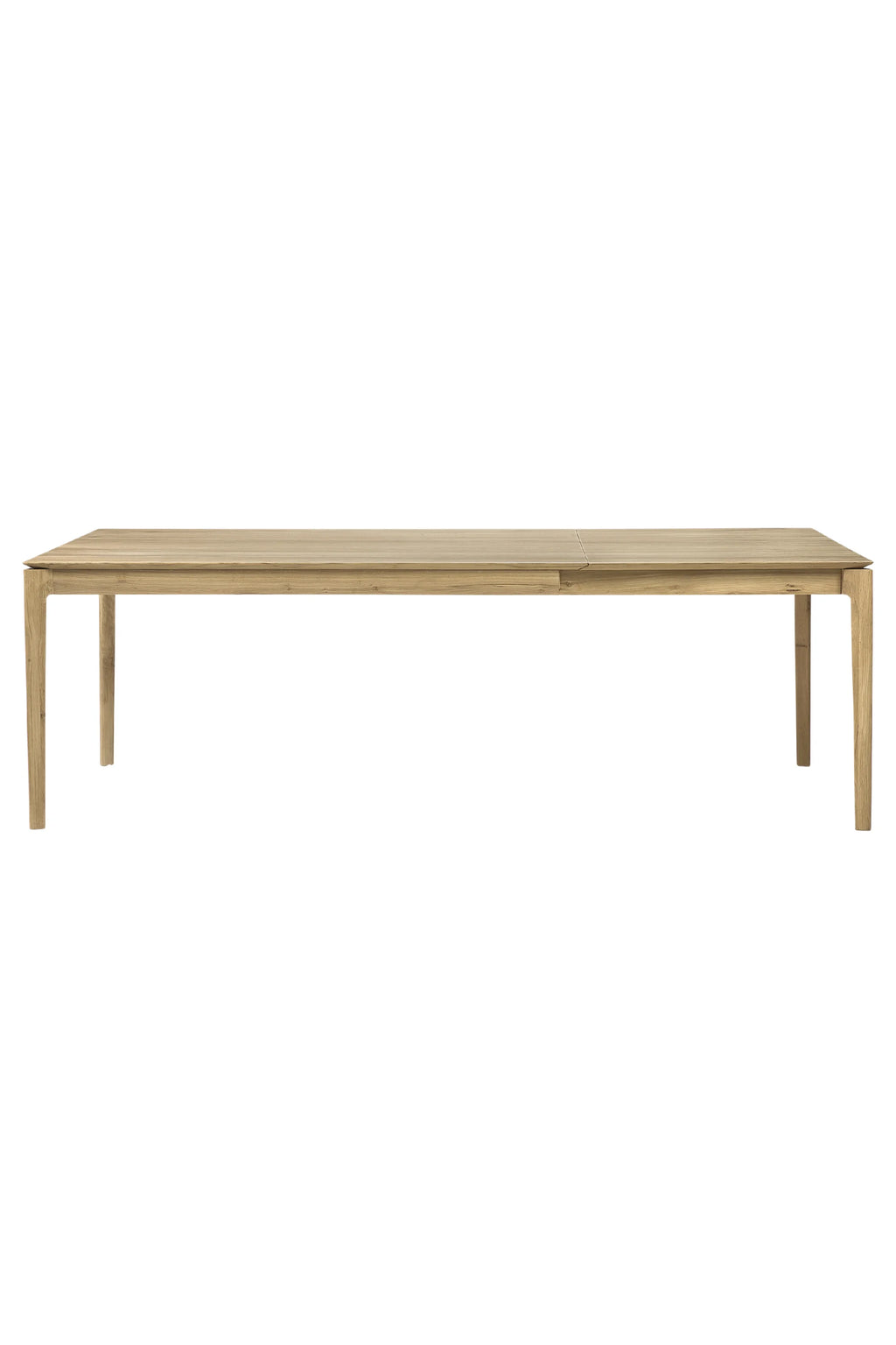 Ethnicraft Bok Extendable Dining Table, a sleek modern minimalist dining table crafted from solid oak wood with a natural light finish. Its rectangular silhouette features clean lines, subtly tapered legs, and an integrated extendable leaf for versatile seating. Perfect as a Scandinavian dining table for contemporary dining rooms or open-plan kitchen spaces.