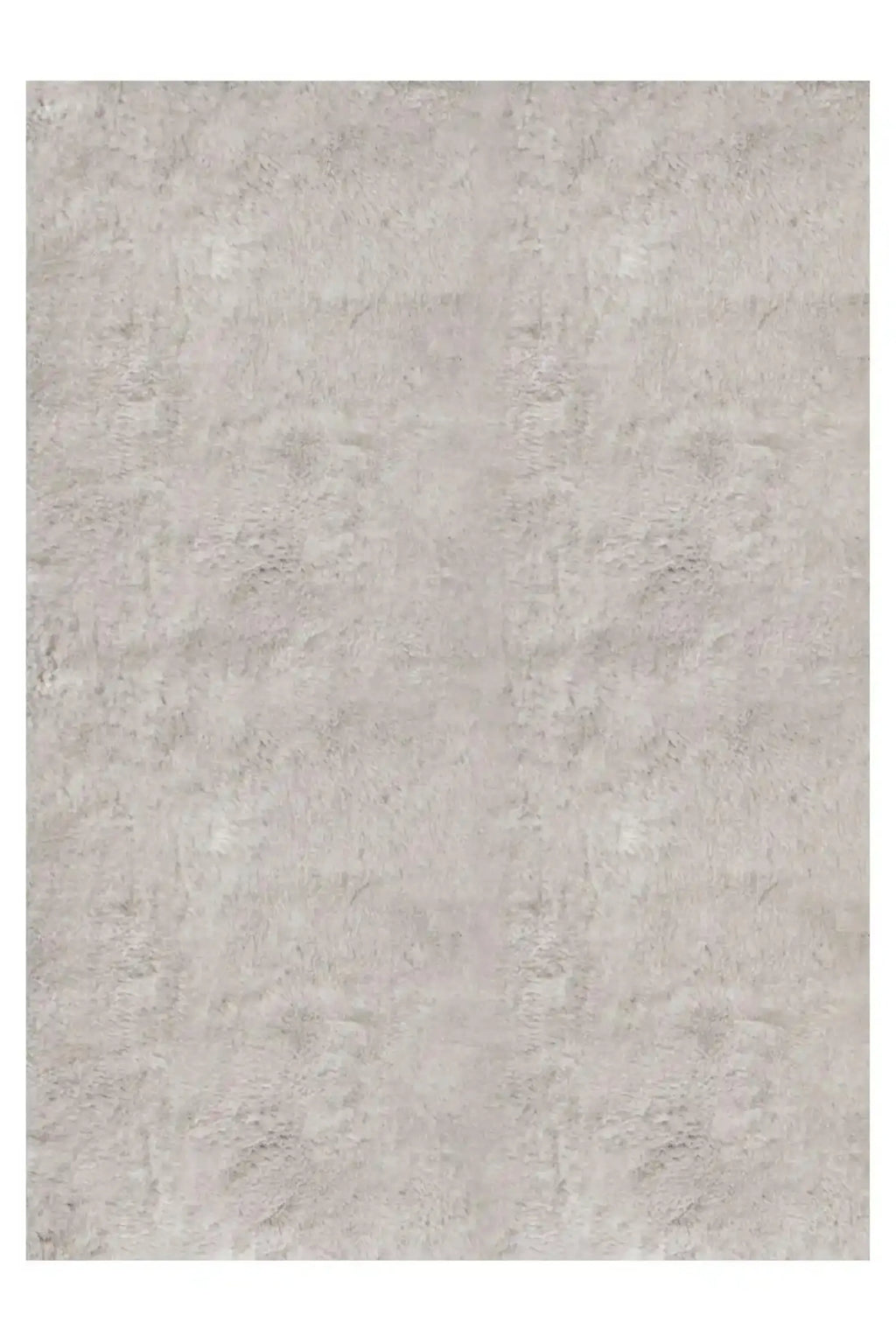 Layered Artisan Wool Rug, a plush, textured light gray area rug with a soft pile, offering luxurious comfort and warmth. Perfect for adding a cozy, modern touch to any living room or bedroom.