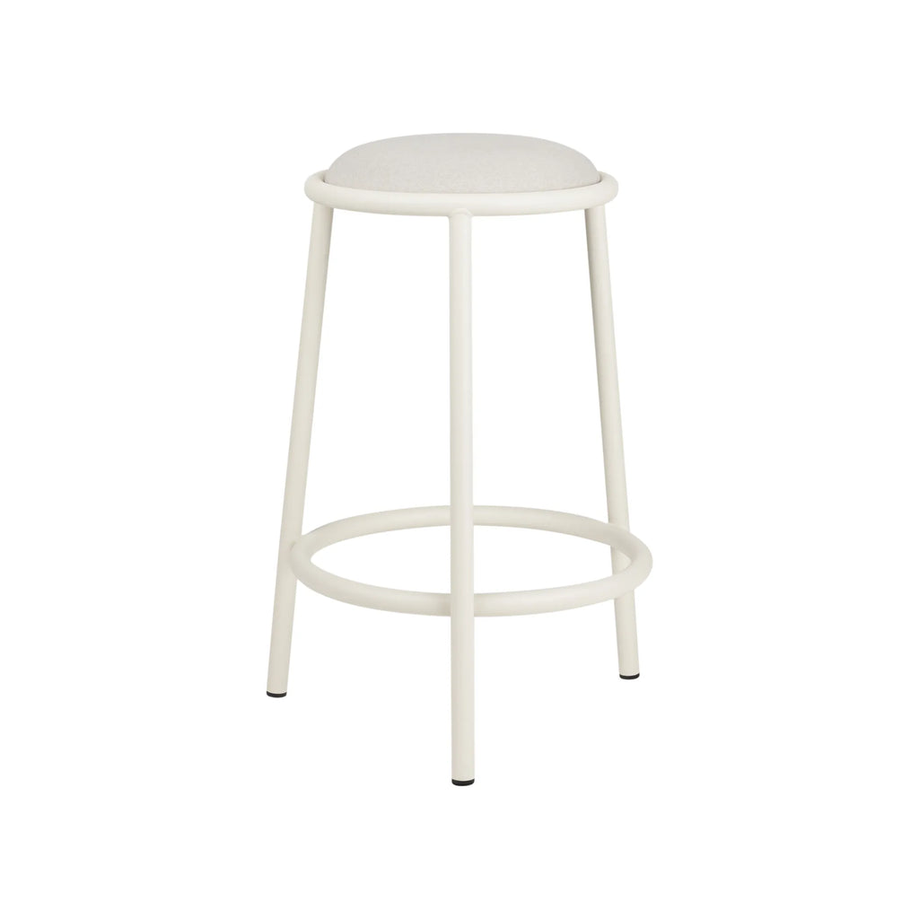 noo.ma Hogo Bar Stool, a modern minimalist bar stool featuring a slender off-white matte metal frame with three legs and a circular footrest, complemented by a plush round upholstered seat in a light textured fabric. This Scandinavian-inspired bar stool is ideal for contemporary kitchen islands or stylish home bar areas.
