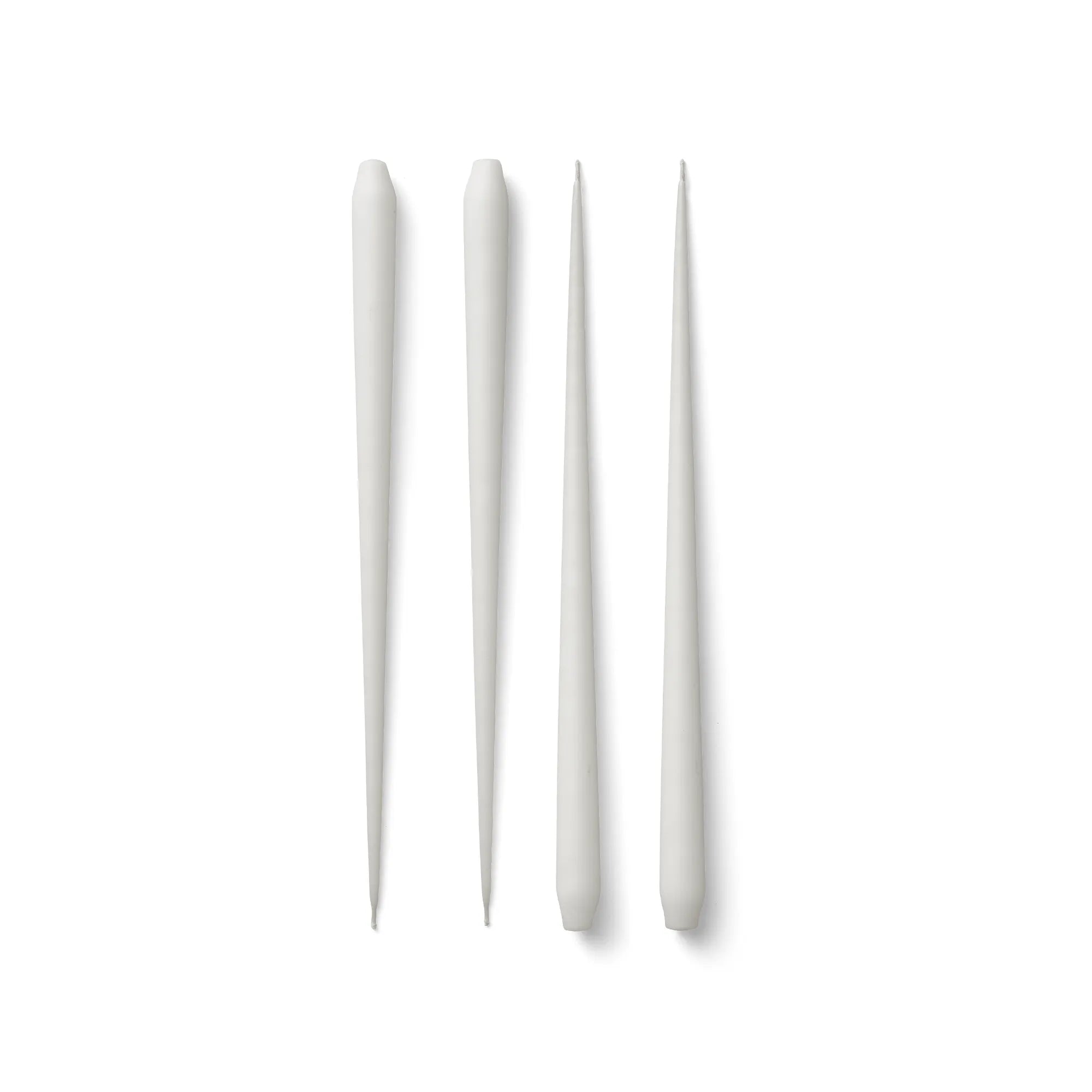 Bundle of 4 tall and graceful taper candles for dinner table setting