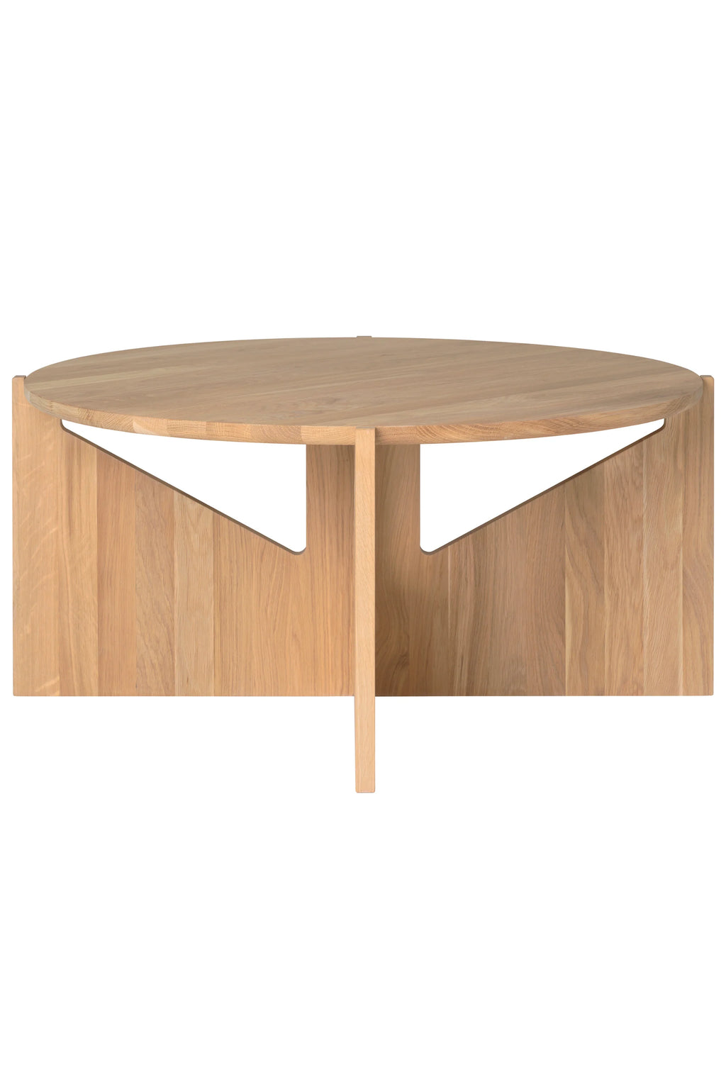 Kristina Dam Simple XL Coffee Table, a large round modern minimalist coffee table crafted from beautiful light natural solid oak wood, featuring a smooth circular tabletop and a unique geometric base with clean, intersecting panels. Its subtle wood grain and architectural design embody Scandinavian elegance, making it perfect as a striking centerpiece for contemporary living rooms and organic modern interiors.
