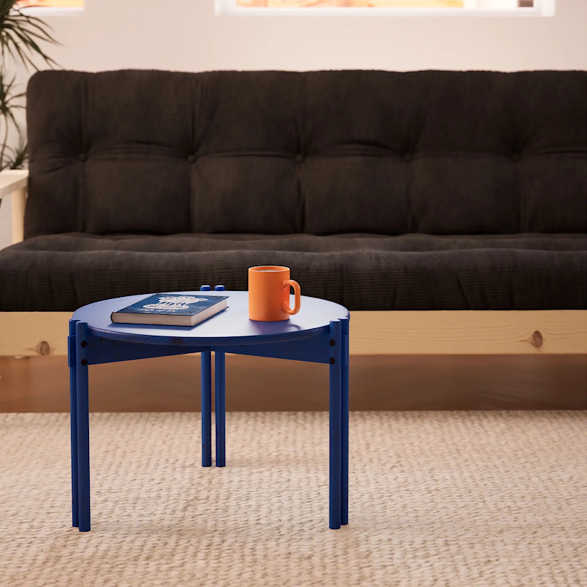 Modern minimalist high coffee table with sleek wooden sticks design