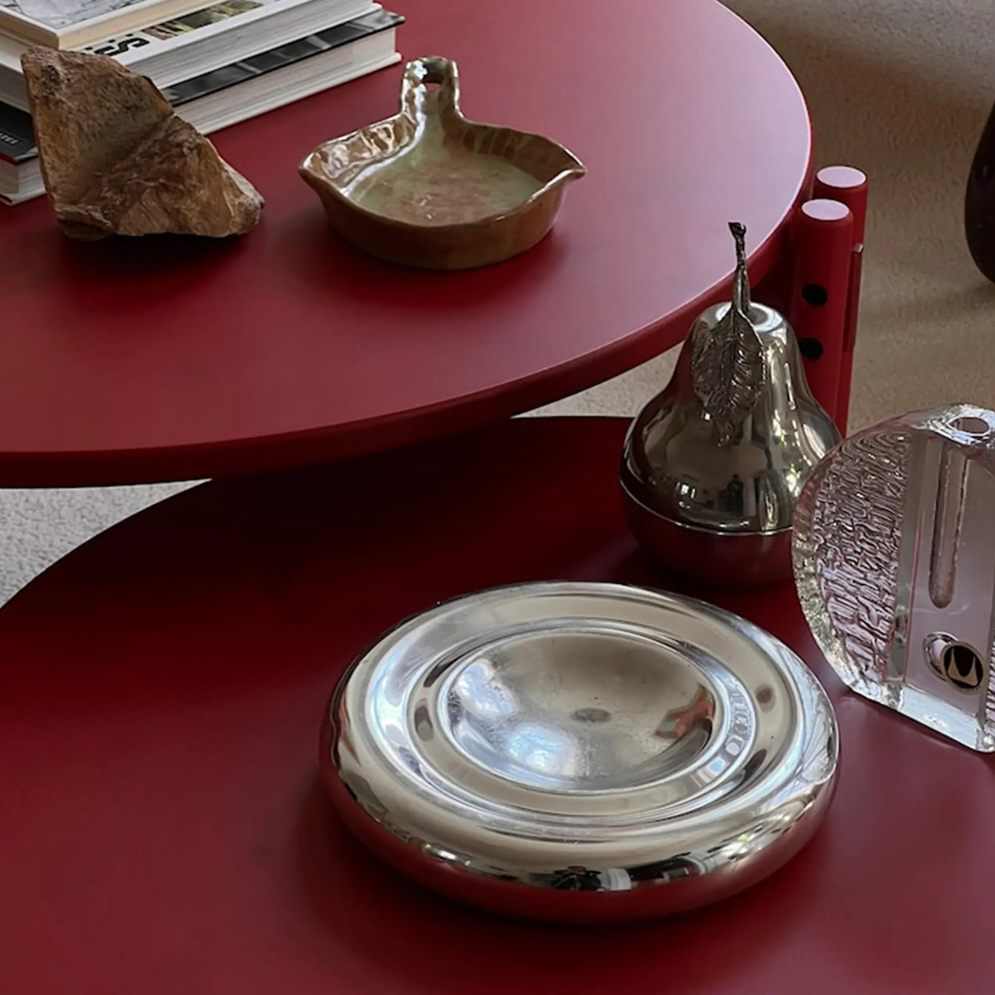Trendy and functional furniture piece with elevated surface for decor and storage