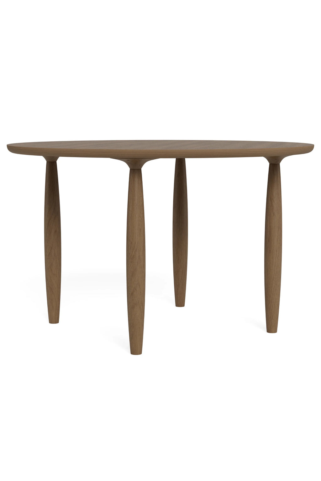 NORR11 Oku Round Dining Table, a modern minimalist dining table crafted from light natural oak solid wood with a smooth, visible grain. It features a sleek round tabletop supported by four organically shaped, tapered cylindrical legs, creating a Scandinavian aesthetic. Ideal for contemporary dining rooms or minimalist kitchen spaces.