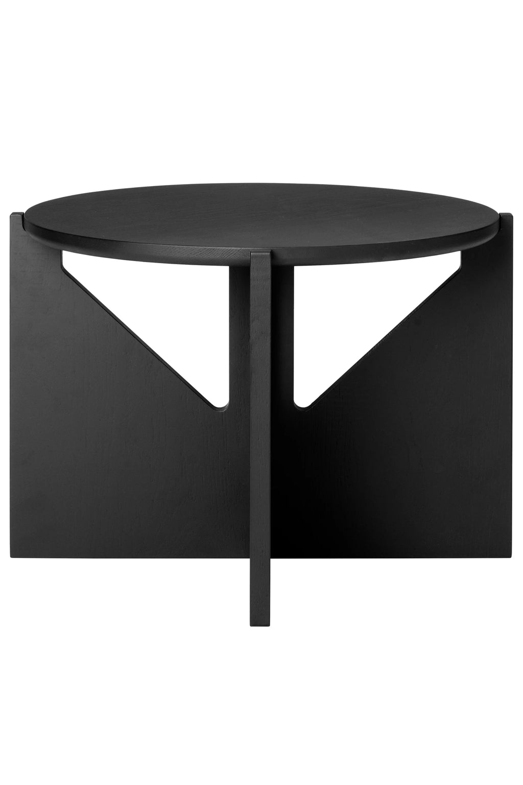 Kristina Dam Simple Coffee Table, a striking modern minimalist coffee table crafted from solid wood with a matte black finish, featuring a round tabletop and a distinctive geometric base with triangular cutouts and a central support. The visible wood grain texture adds a natural element to its sleek contemporary design. Ideal as a statement piece for a Scandinavian living room or a sophisticated accent in any modern interior.