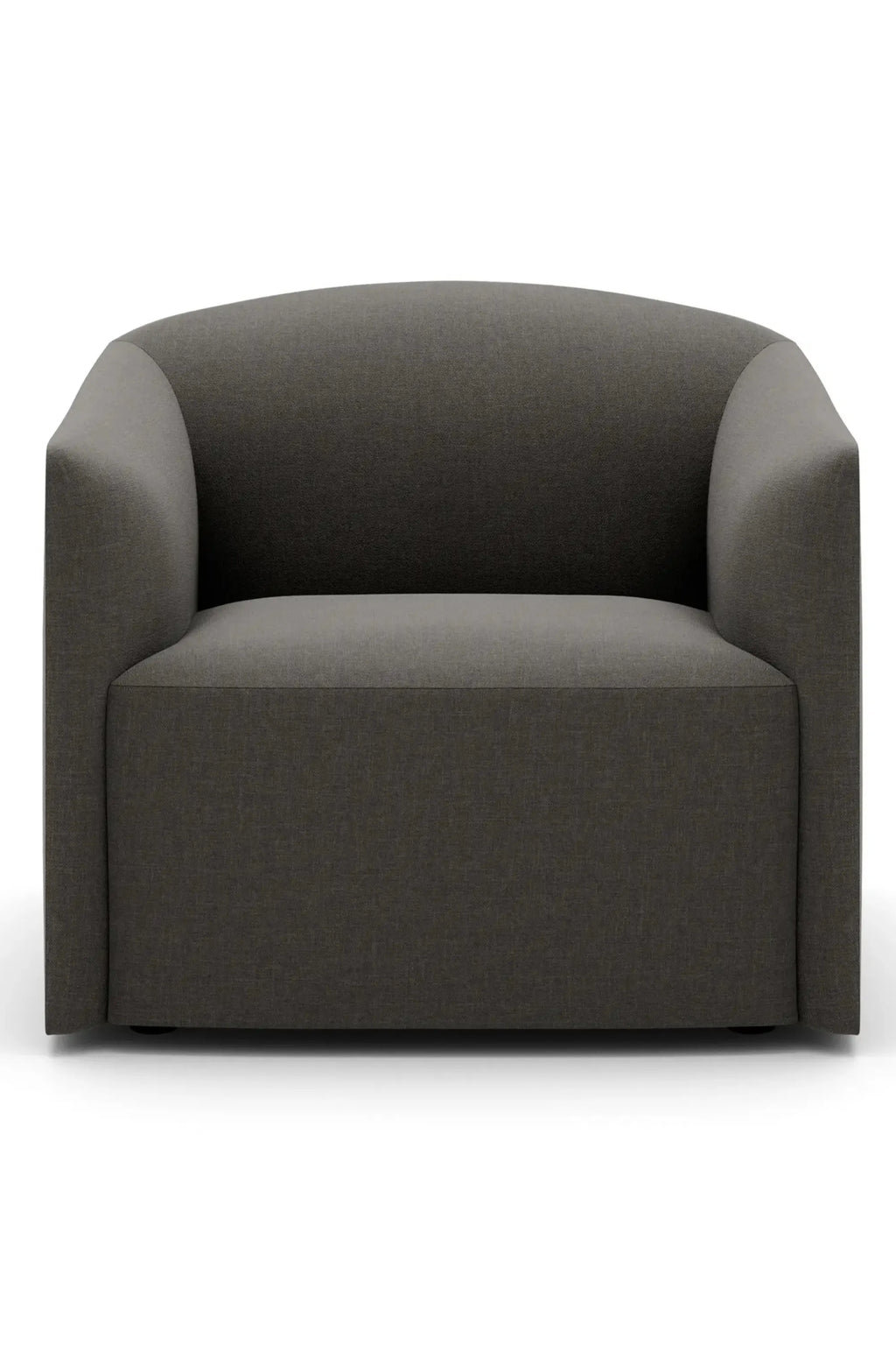 New Works Shore Lounge Chair - Extended Base, a deep charcoal grey upholstered lounge chair featuring a subtly textured fabric and a sleek, low-profile design with a wide, curved backrest and arms. This sculptural, organic modern accent chair offers deep comfort with its substantial extended base, perfect for contemporary living rooms or minimalist lounge areas.