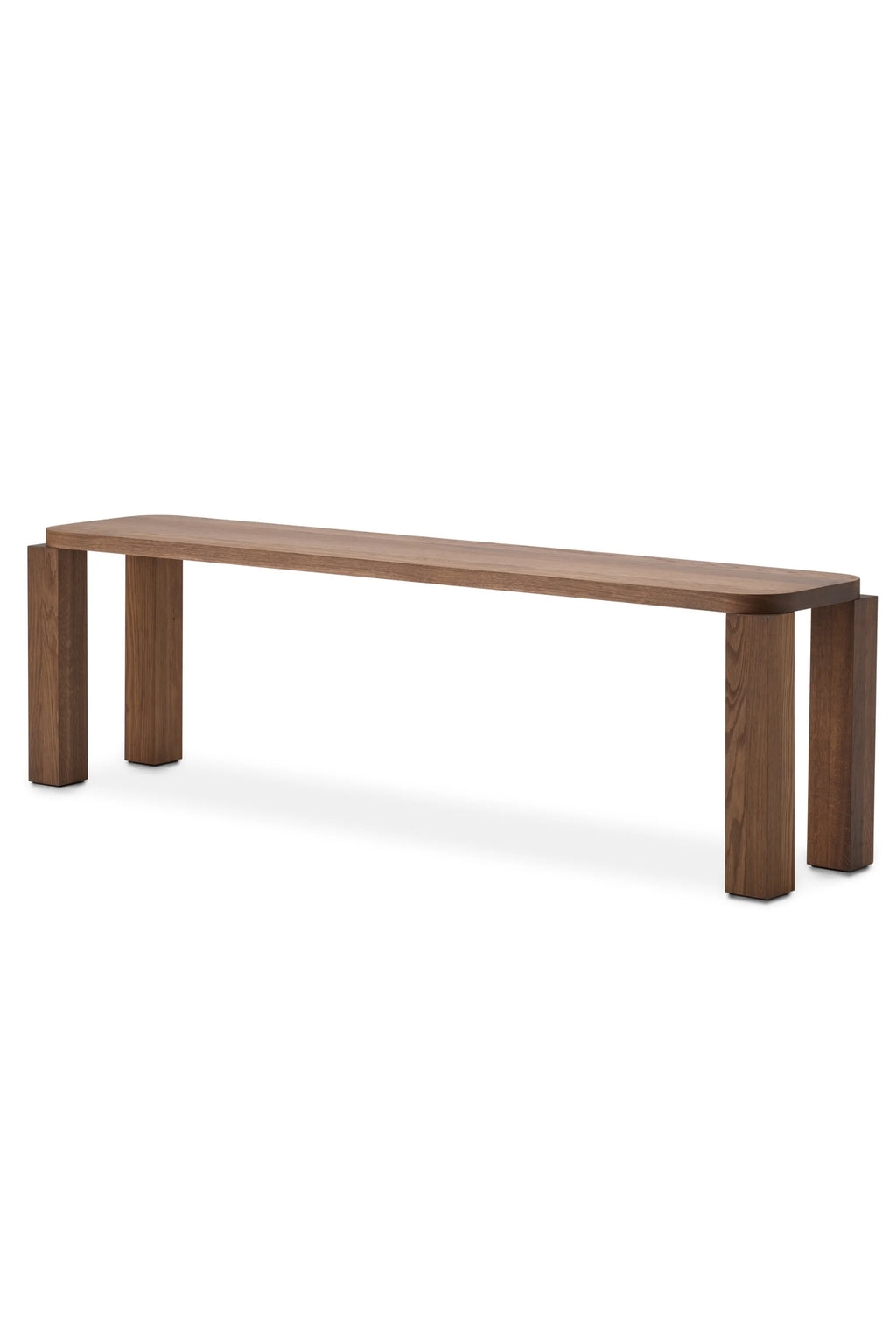 New Works Atlas Bench, a modern minimalist long wooden bench crafted from solid dark oak with a smooth finish and visible grain. It features a thick, rectangular top with elegantly rounded edges and sturdy, block-like legs inset from the ends. Perfect as a contemporary dining bench, entryway seat, or stylish living room accent.