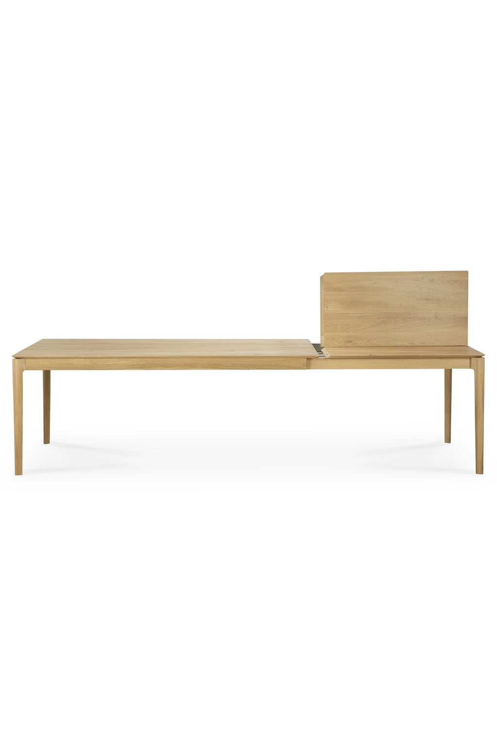 Ethnicraft Bok Extendable Dining Table, a modern minimalist dining table crafted from solid natural oak wood with a visible, smooth grain. It features a clean rectangular silhouette with subtly rounded edges and a clever extension mechanism, shown with a leaf being added to expand the seating. This versatile light wood dining table is perfect for Scandinavian or contemporary dining rooms, offering adaptable seating for everyday meals and entertaining.