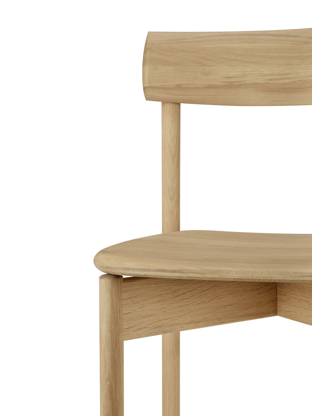 Ethnicraft Risu Dining Chair, a minimalist solid oak dining chair crafted from light natural oak wood, showcasing clean lines and a smooth, warm finish. It features a gently curved backrest and a subtly contoured seat, supported by robust rounded legs, making it an ideal Scandinavian dining chair for modern minimalist kitchens or organic contemporary dining rooms.
