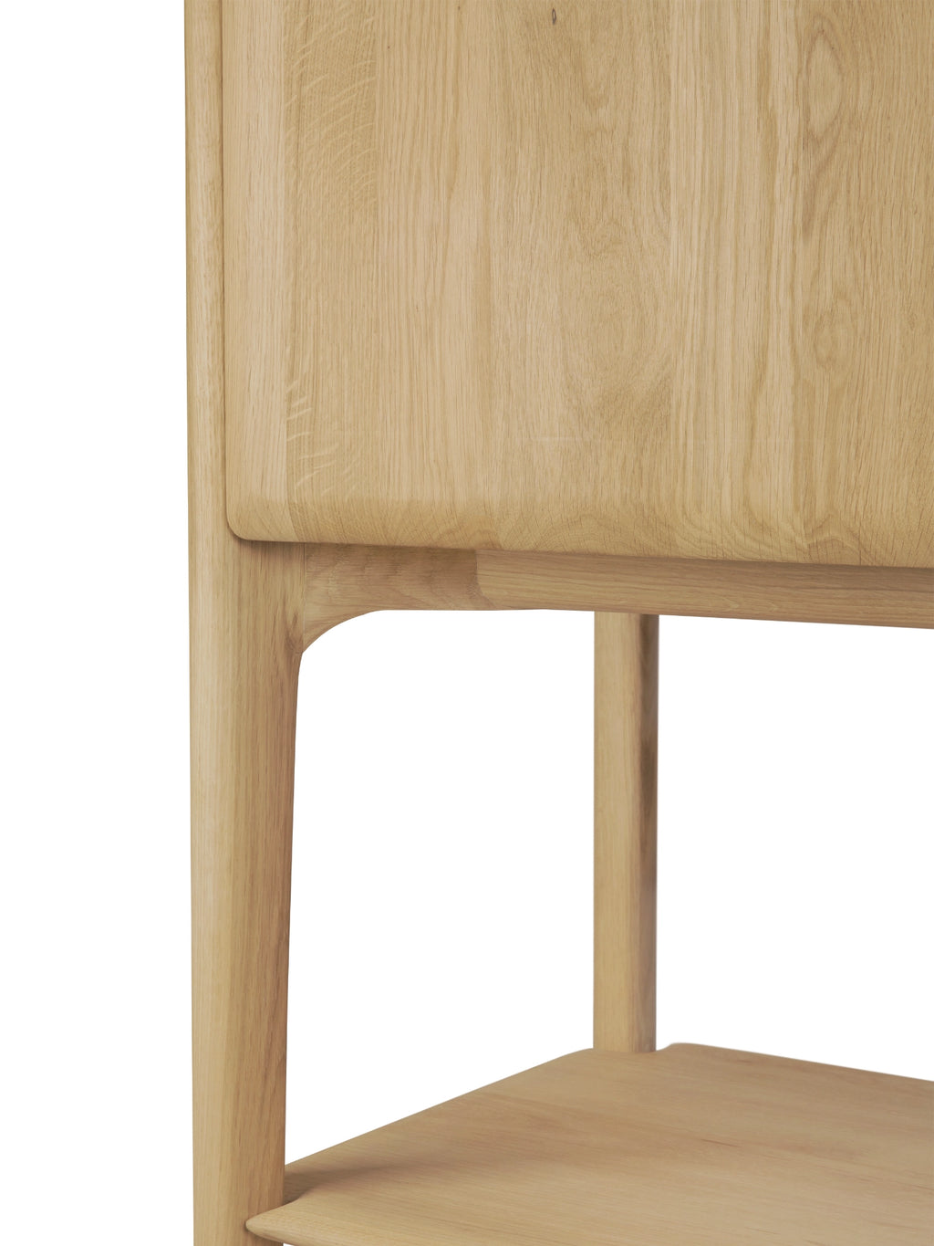 Ethnicraft PI Cupboard, a modern minimalist solid oak cupboard featuring clean lines and a warm natural oak finish, with subtly rounded edges and robust integrated legs that flow seamlessly into the design. This contemporary storage cabinet showcases the beautiful grain and texture of the wood, offering a sophisticated and organic modern aesthetic. Perfect for refined living room storage, a stylish bedroom cabinet, or an elegant entryway console in Scandinavian or japandi interiors.