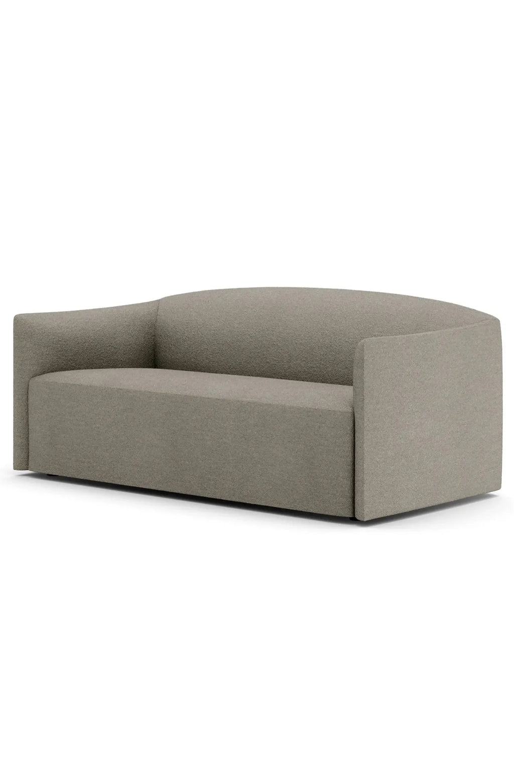 New Works Shore Sofa 2-Seater - Extended Base, a contemporary organic modern sofa upholstered in a warm greige textured fabric, featuring a distinctive low-profile, gently curved silhouette with integrated armrests and a sculptural design. This minimalist 2-seater sofa is perfect for modern living rooms, sophisticated apartment interiors, or as a statement piece in a contemporary home office.