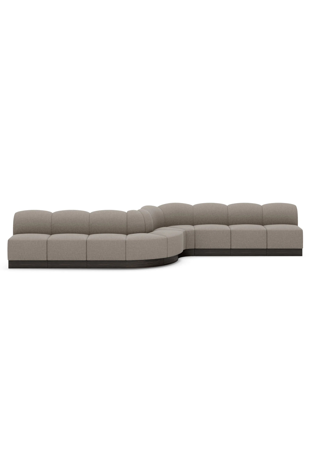 New Works Shore Modular Dining Sofa, a contemporary modular sectional sofa upholstered in light taupe woven fabric, featuring a distinctive curved profile and low-slung design.