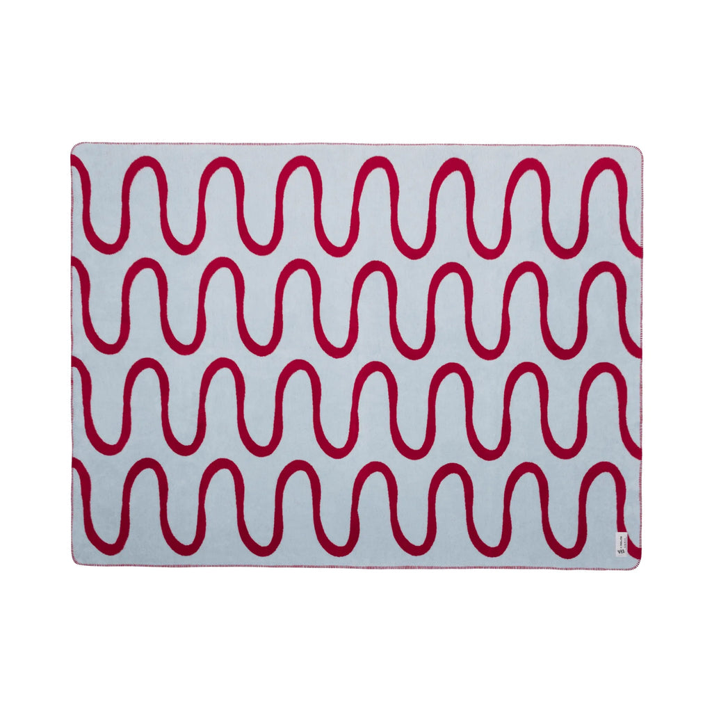 Swirl Throw Blanket in cream color with subtle textured pattern