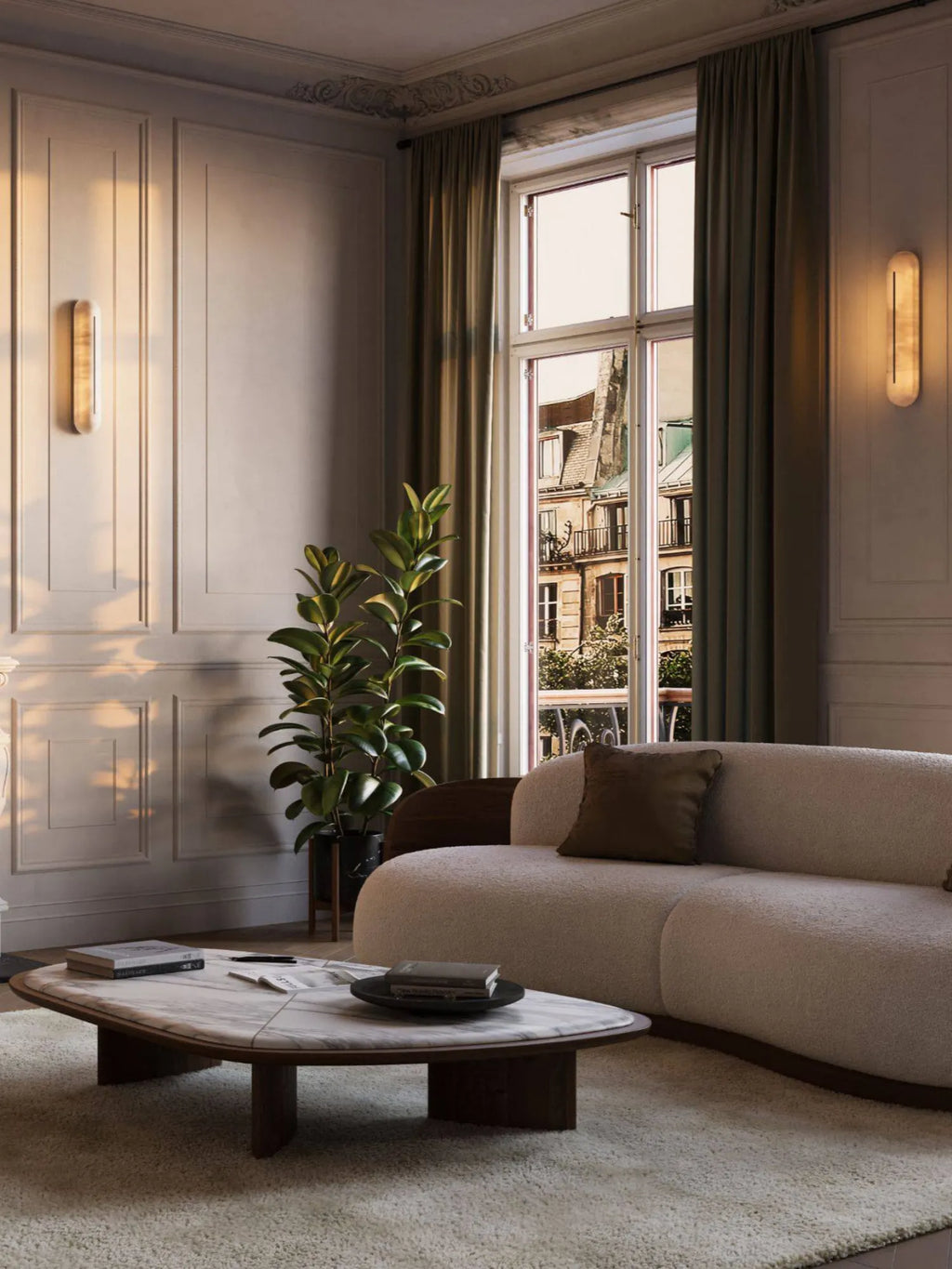 CTO Lighting Hepworth Wall Light, an elegant modern minimalist wall sconce featuring an elongated pill-shaped shade crafted from natural alabaster stone with subtle veining, emitting a warm, diffused glow. This luxury wall light is perfect for sophisticated living room lighting, bedroom accents, or hallway illumination in contemporary organic modern interiors.