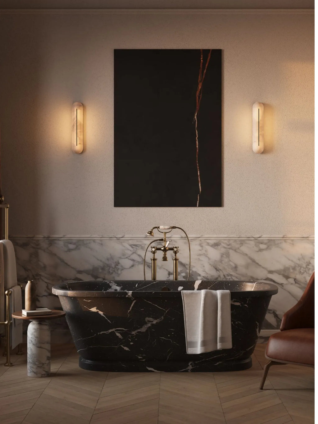 CTO Lighting Hepworth Tall Wall Light, a luxurious contemporary wall sconce crafted from natural alabaster with a sleek, elongated oval shape and a subtle brass-finished metal insert that creates a captivating linear glow. This elegant alabaster wall light emits a warm, diffused light, perfect for creating an ambient atmosphere in luxury bathrooms, hallways, or sophisticated living spaces with organic modern or Art Deco inspired interiors.