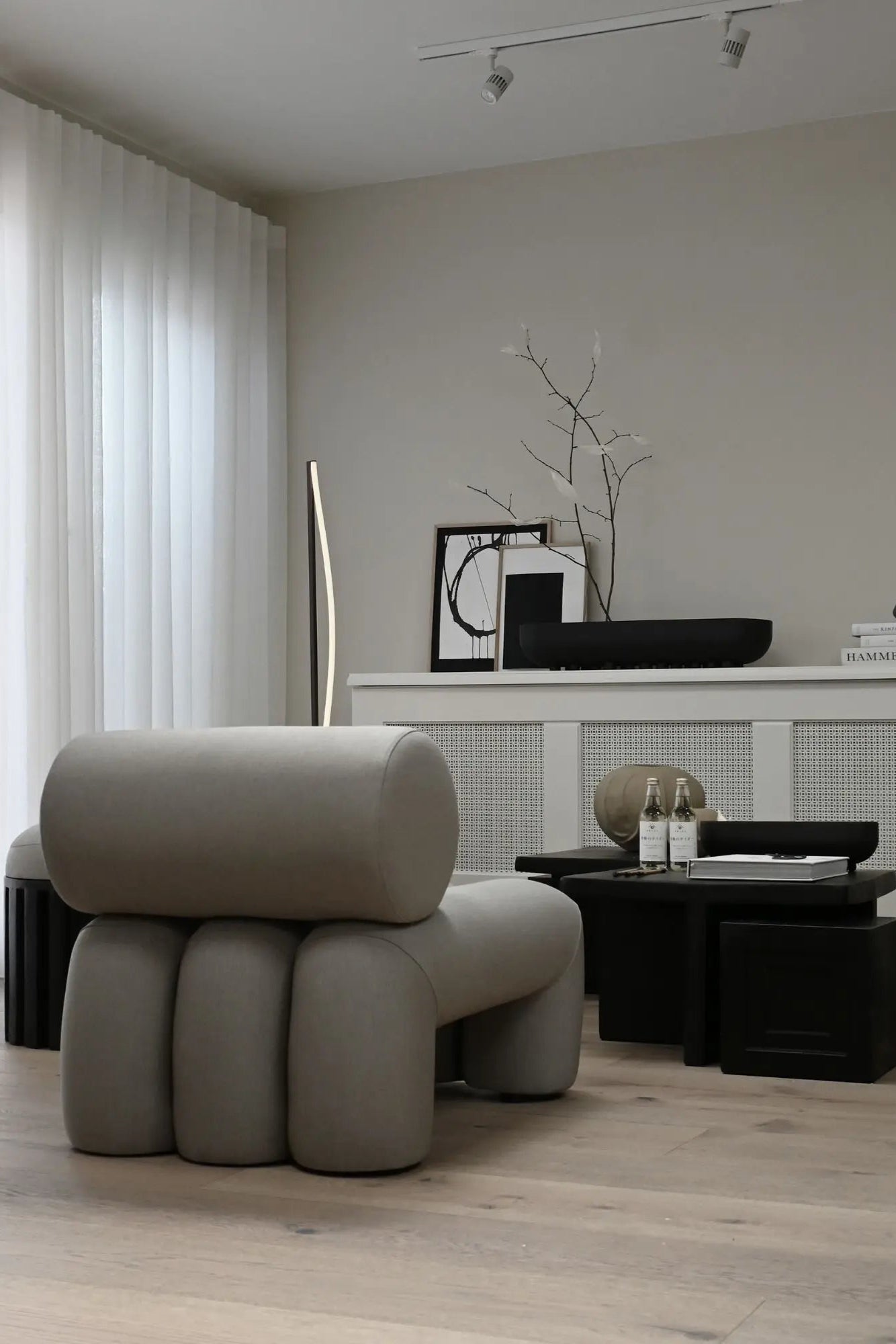 Foku Lounge Chair in a luxurious hotel lobby with elegant decor