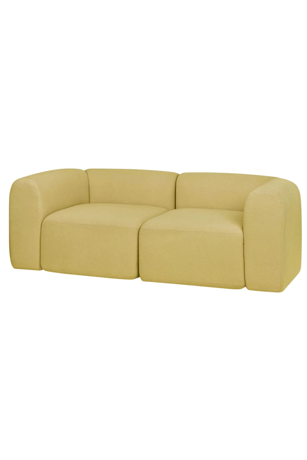 noo.ma Flom 2-Seater Sofa, a contemporary modular sofa upholstered in a soft, textured pale lime green fabric. It features a low-profile design with inviting deep seating and gently rounded edges, creating an organic modern aesthetic. This stylish two-seater is perfect for minimalist living rooms, apartment spaces, or as a cozy accent sofa.