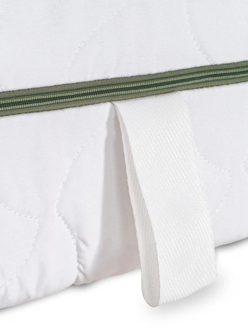 Mattress Comfort Mattress, a white quilted mattress with a soft, breathable fabric cover featuring distinct stitched patterns and a durable olive green zipper closure. It includes a sturdy white woven handle strap for easy positioning or moving, designed for comfortable sleep and long-lasting support in any bedroom.