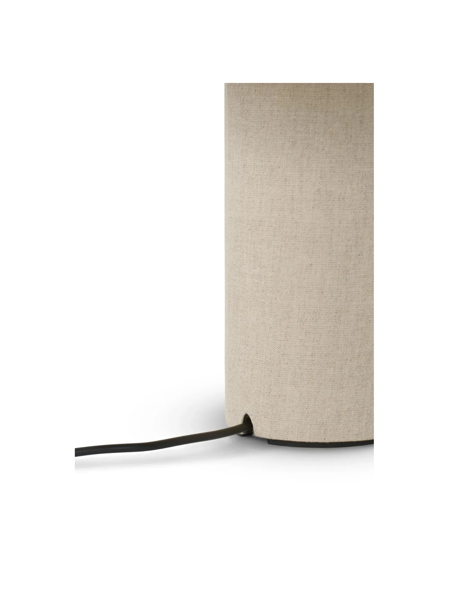 New Works Margin Portable Table Lamp, featuring a textured light beige fabric base and shade, with a black power cord detail entering the bottom. A premium modern lighting solution.