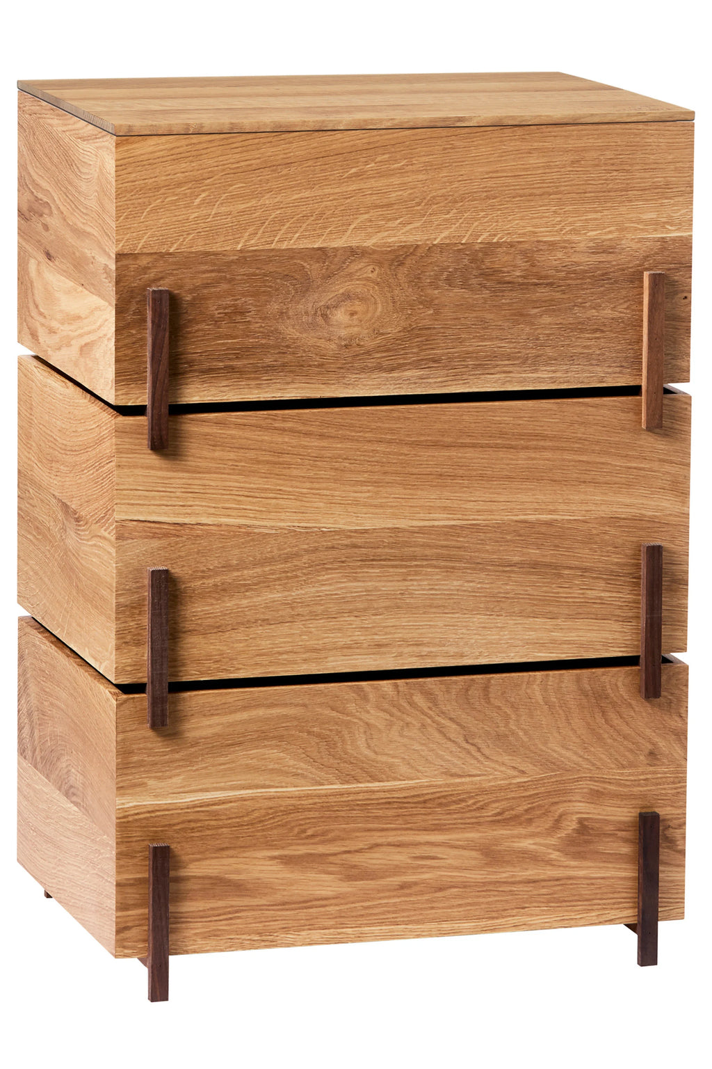Kristina Dam Stack Storage Box - Set of 3, a modern minimalist storage solution crafted from beautiful natural solid oak wood with a distinct grain, featuring three stackable rectangular boxes. Each box is accented with slender contrasting dark brown wood pull handles and stands on subtle dark wood feet, embodying clean Scandinavian design. Perfect for elegant living room organization, bedroom storage, or contemporary home office shelf styling.