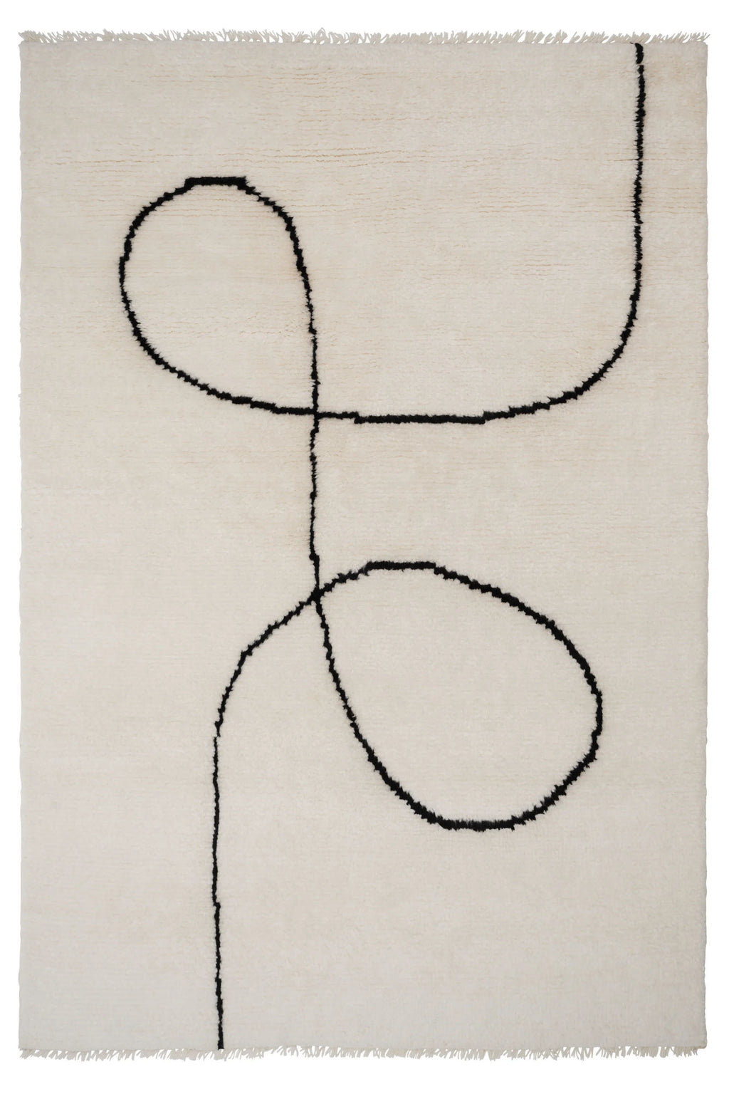 Linie Design Astral Spiral Wool Rug, a plush hand-tufted cream wool area rug featuring a striking black abstract spiral line design and delicate fringed edges. This contemporary rug offers a soft, inviting texture and a minimalist aesthetic with its organic, continuous single line pattern. Ideal for adding an artistic touch to Scandinavian living rooms, modern minimalist bedrooms, or cozy office spaces.