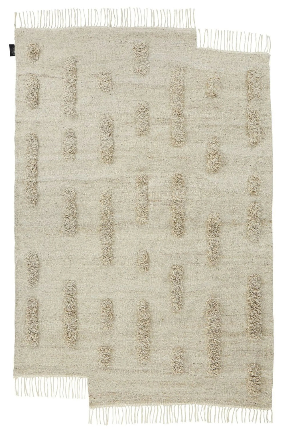 Sera Helsinki Laine Rug, a premium hand-knotted wool area rug in natural cream and off-white tones, featuring a unique textured design with raised, shaggy rectangular patterns against a flat woven background. This organic modern rug has delicate fringed edges and subtle color variations, creating a soft, inviting aesthetic. Ideal for adding warmth and minimalist style to Scandinavian living rooms, cozy bedrooms, or contemporary nurseries.