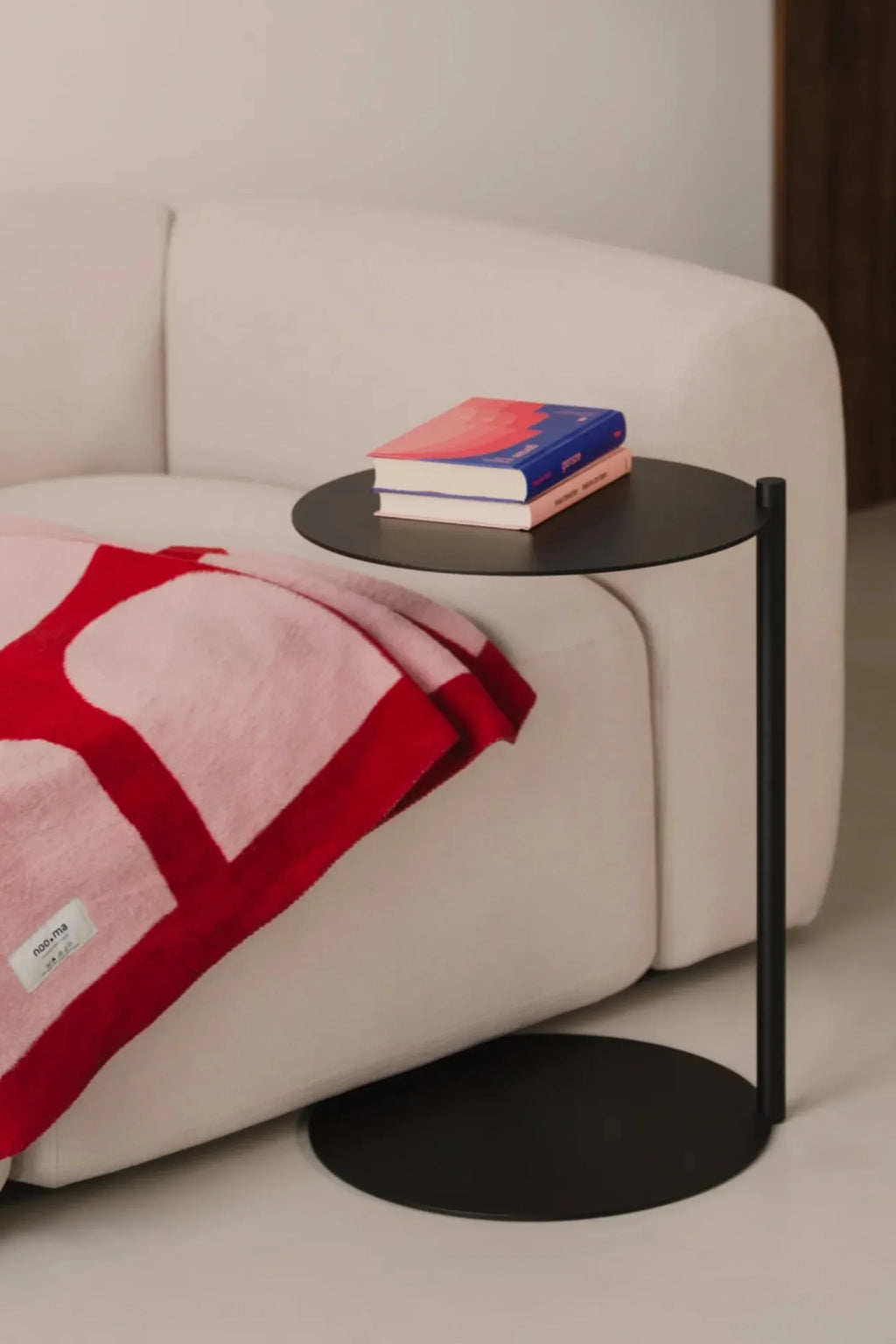 noo.ma Flom 3-Seater Sofa, a contemporary cream-colored sofa featuring plush upholstered fabric and a gently curved, organic profile with deep seating and rounded armrests. This minimalist 3-seater sofa is perfect for modern living rooms or Scandinavian-inspired spaces seeking a comfortable and stylish focal point.