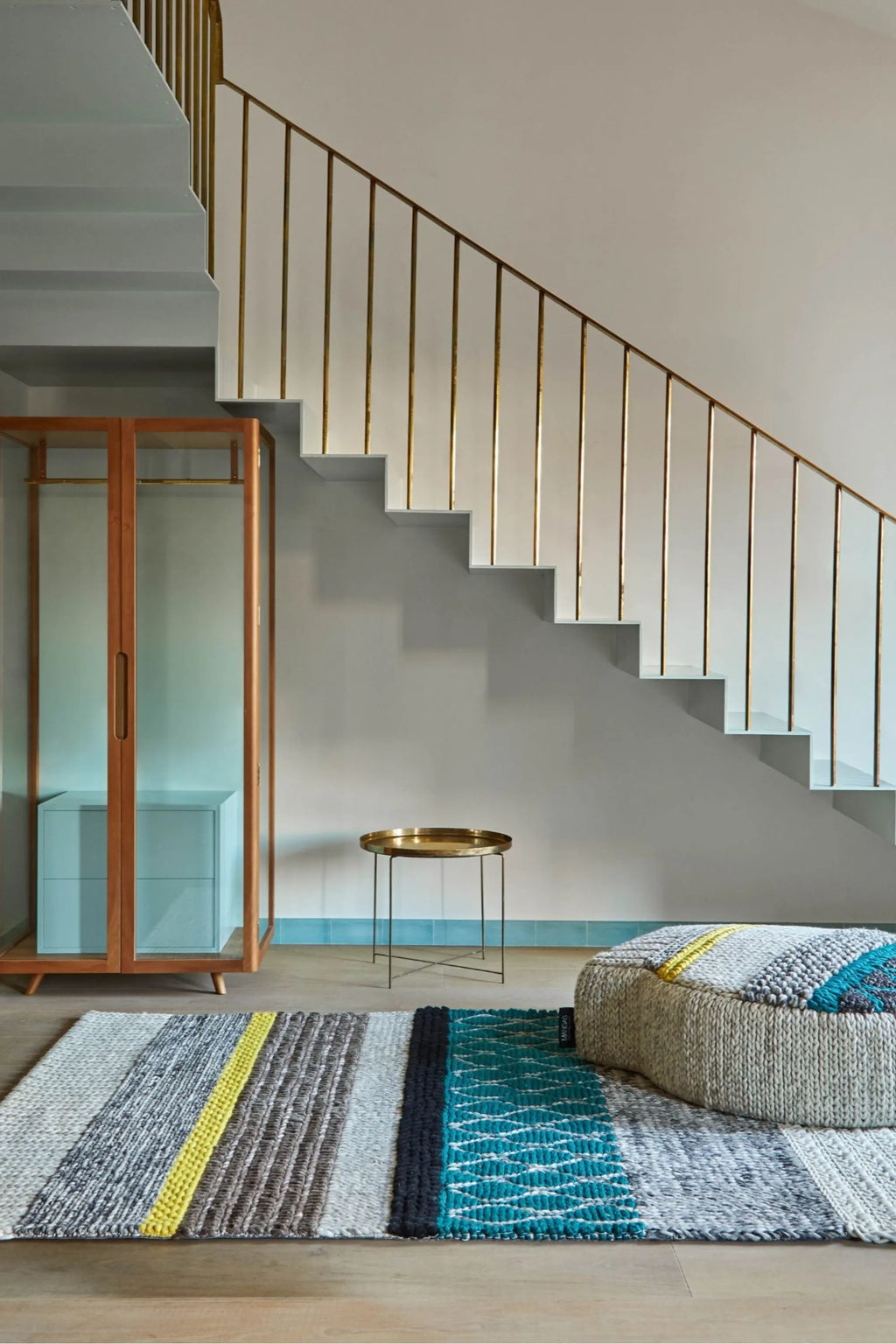 GAN Rugs Mangas Original Rectangular Rug, a vibrant multi-colored hand-knotted wool area rug featuring a modern striped design with diverse chunky knit textures in a palette of light grey, dark grey, brown, bright yellow, black, and teal. This contemporary designer rug showcases a blend of ribbed and wavy patterns, offering a cozy, eclectic aesthetic. Ideal for adding a statement to Scandinavian living rooms, modern bedrooms, or unique entryways.