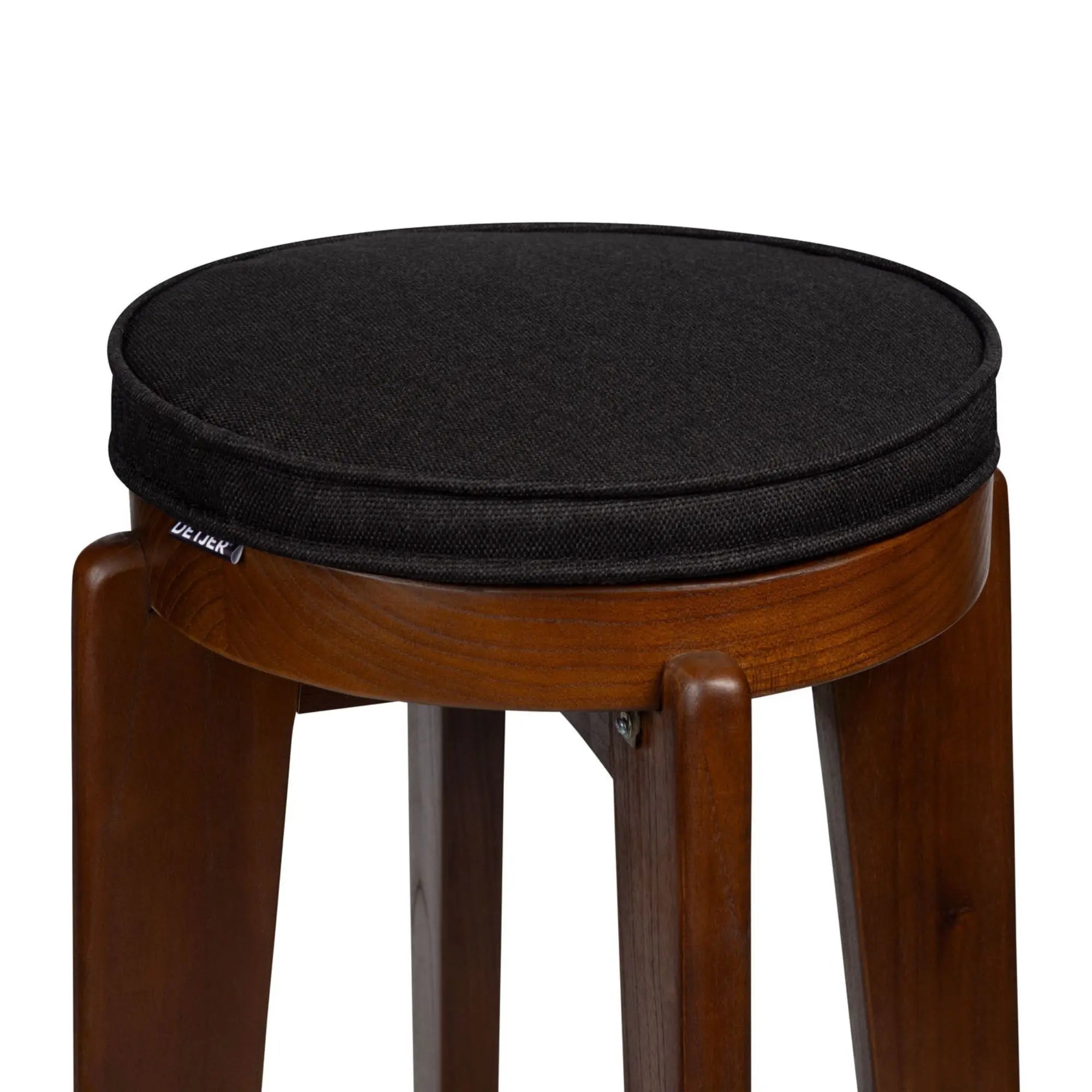 Contoured cushion for barstool designed to relieve pressure and improve posture
