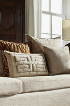 Cleo Cushion with a stylish fringe detail in a versatile cream color