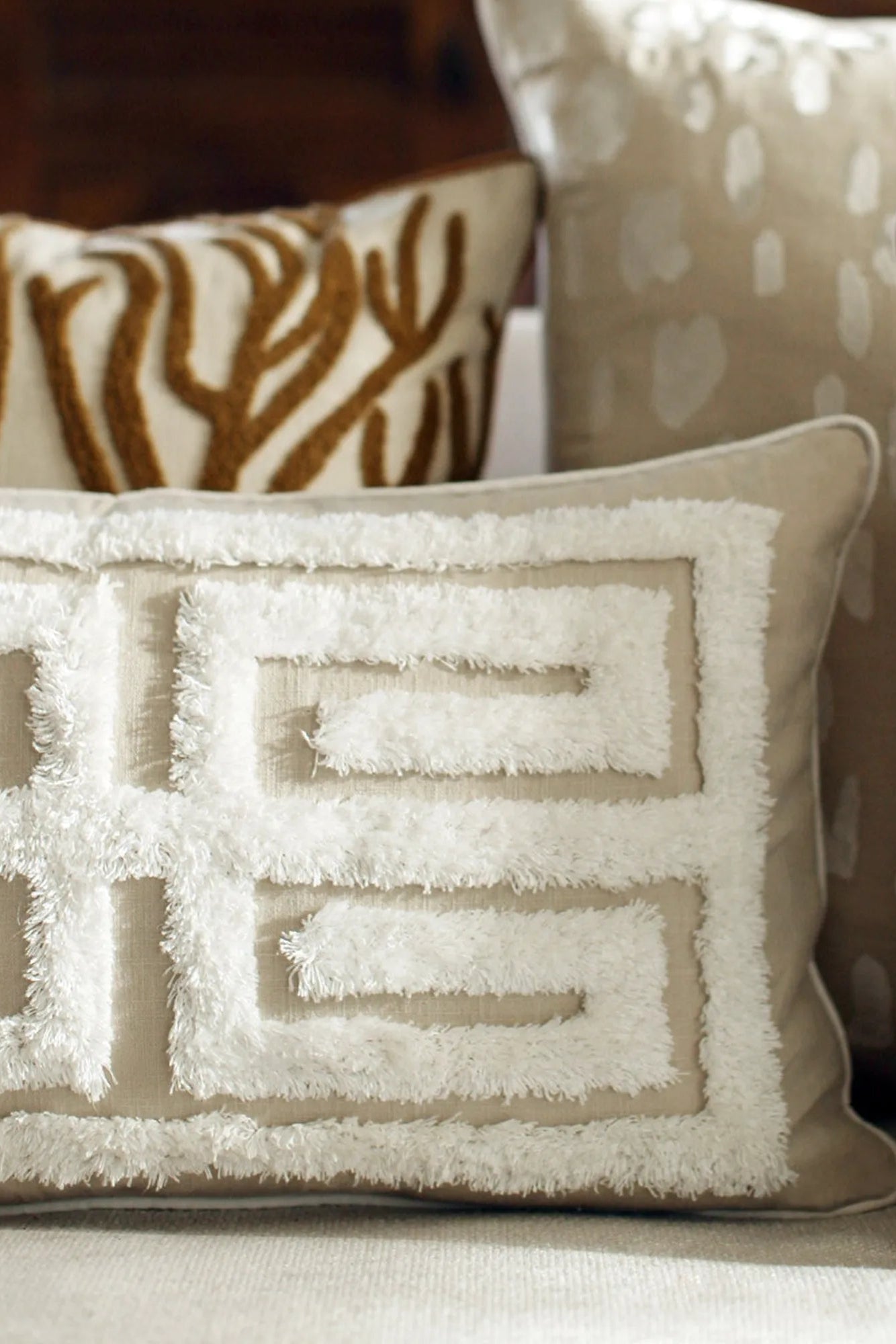 Cleo Cushion in a classic stripe pattern in timeless black and white