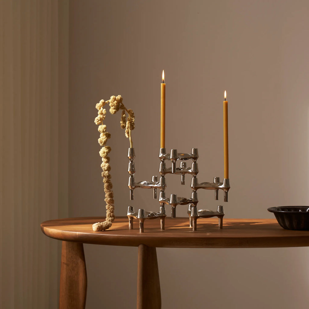 Stoff Nagel BMF Vase, a modular chrome-plated metal candle holder featuring an iconic interlocking geometric design and polished silver finish.
