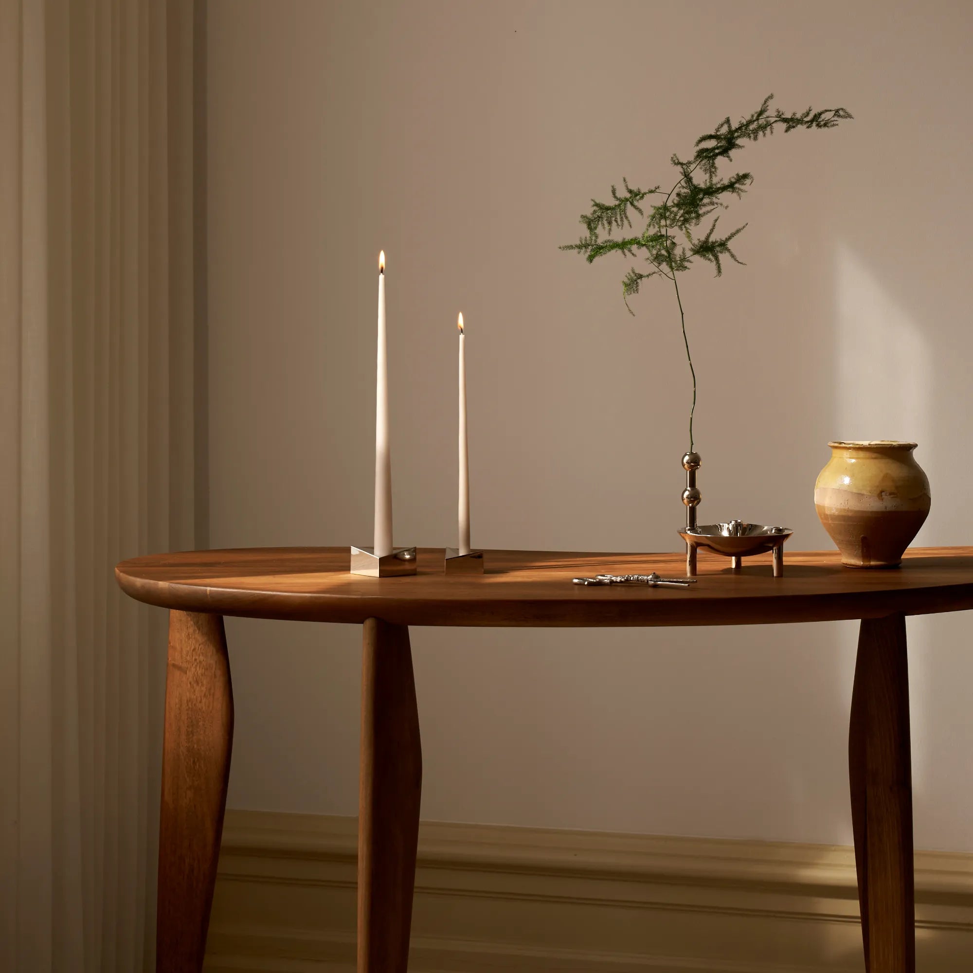 Handcrafted ceramic candle holder bowl with textured surface and matte finish