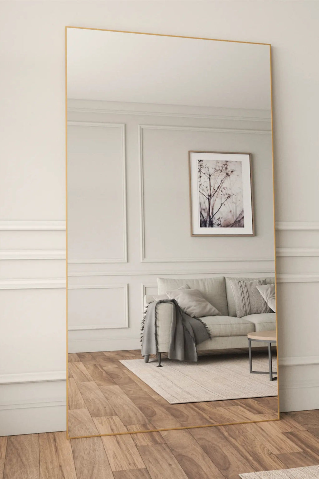 TCL Studios Sleek Full Length Mirror, a tall rectangular full length mirror featuring a thin, minimalist gold metal frame with clean lines. Its contemporary design and expansive reflective surface are perfect for brightening modern minimalist or Scandinavian interiors. Ideal as a versatile standing floor mirror or wall mirror for bedrooms, living rooms, or entryways, enhancing both space and light.