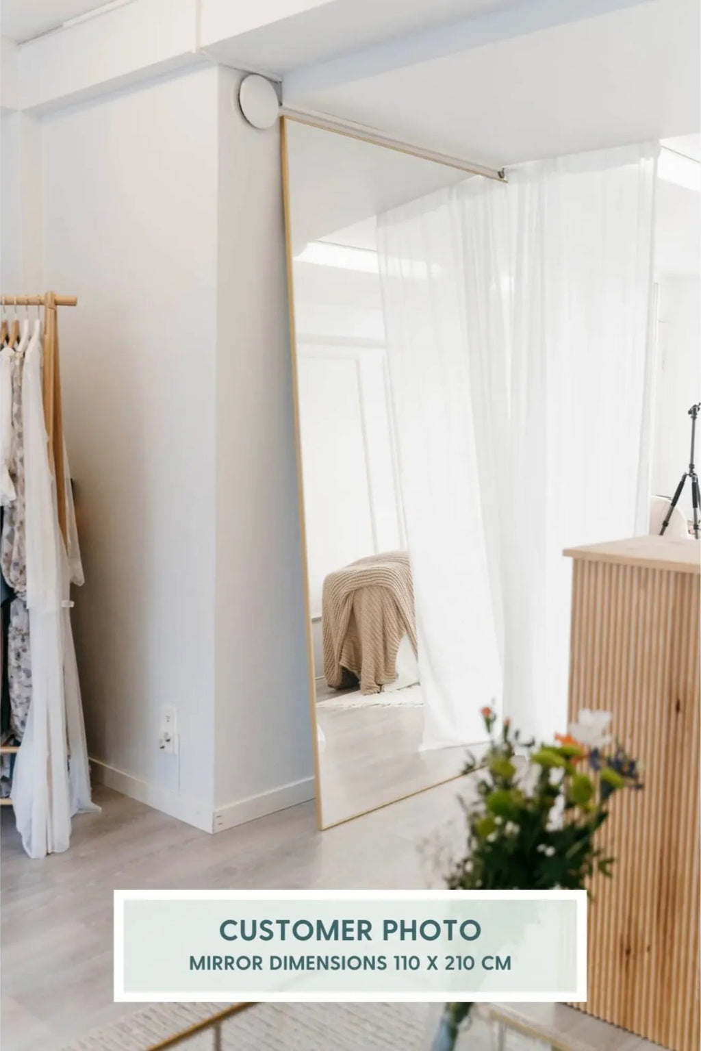 TCL Studios Sleek Full Length Mirror, a tall rectangular floor mirror featuring a slender brushed brass frame and a clean, modern minimalist design with an expansive reflective surface. This large 110 x 210 cm contemporary mirror is perfect as a Scandinavian bedroom dressing mirror, a stylish entryway accent, or for a modern retail boutique.