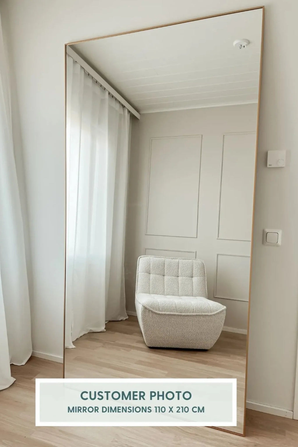 TCL Studios Sleek Full Length Mirror, a large rectangular floor mirror featuring a thin, natural light wood frame that perfectly complements modern minimalist and Scandinavian interior designs. This versatile full-length mirror is ideal for brightening a bedroom, entryway, or living room while serving as a functional dressing mirror.