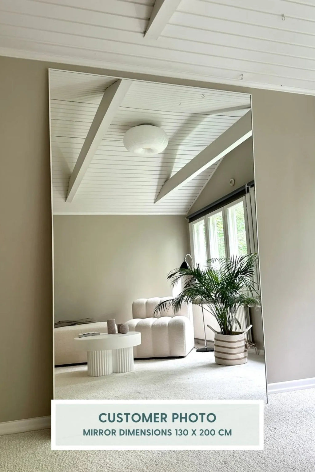 TCL Studios Sleek Full Length Mirror, a large rectangular floor mirror featuring a modern minimalist design with an ultra-thin, almost frameless edge that blends seamlessly into any space. Its expansive reflective surface creates depth and light, perfect for contemporary living rooms, spacious bedrooms, or stylish entryways as a functional dressing mirror.
